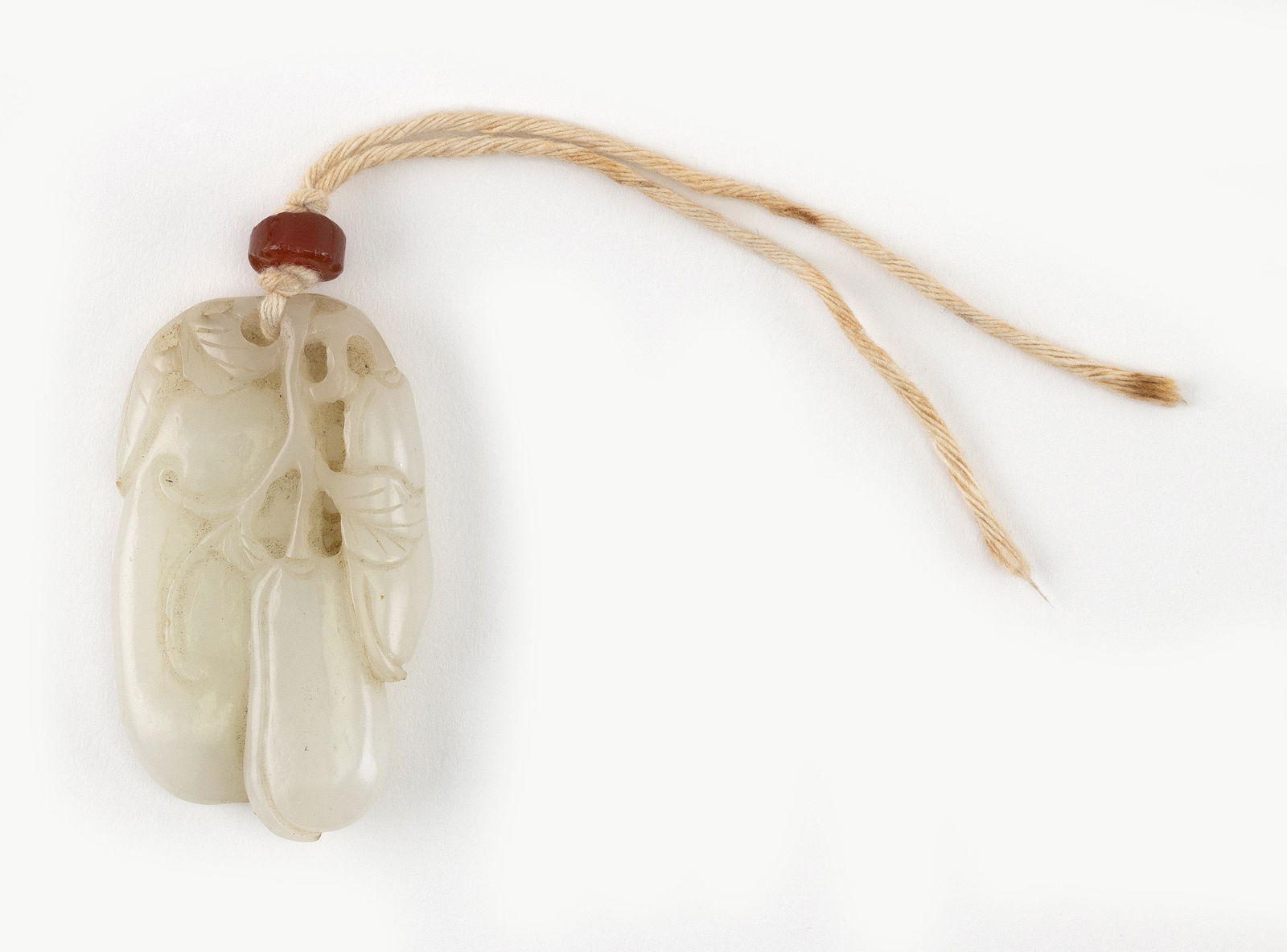 CHINESE CARVED WHITE JADE PENDANT Length 2". (1 of 2)