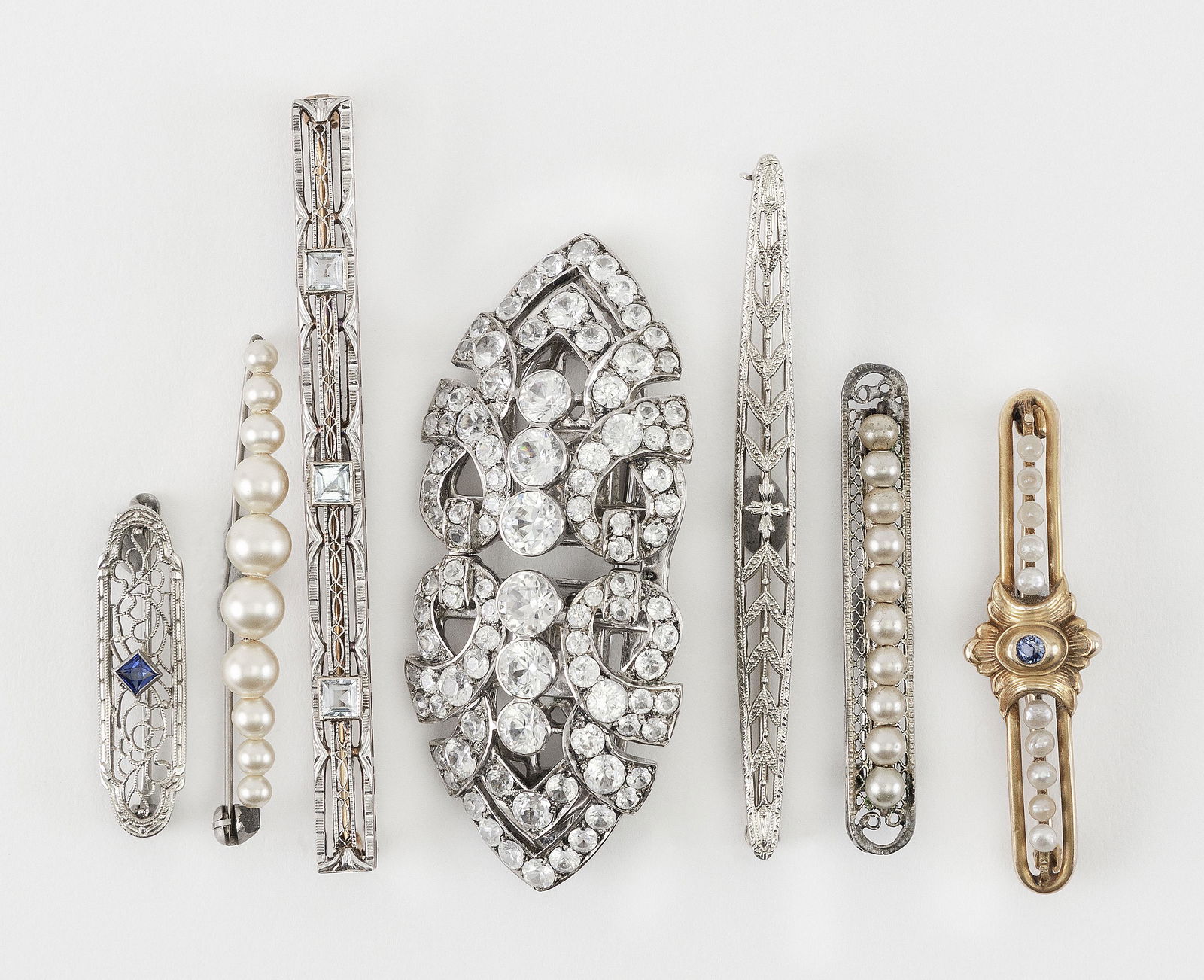 SEVEN PINS AND BROOCHES (1 of 1)