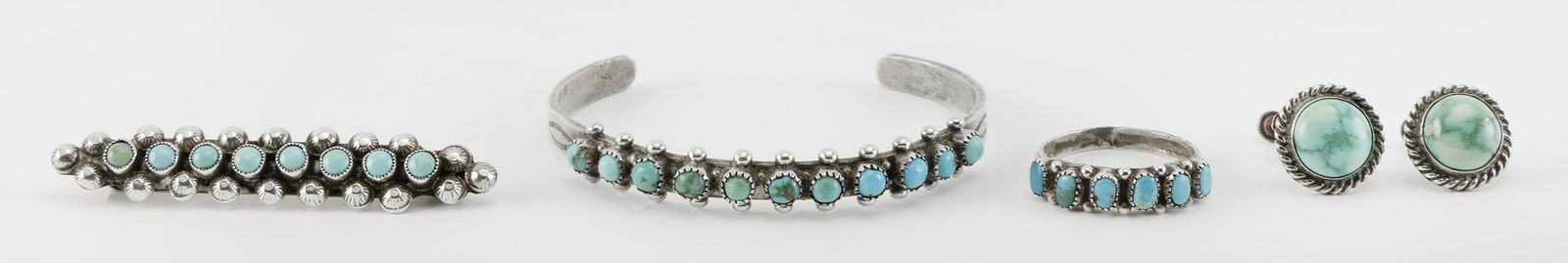 FOUR PIECES OF AMERICAN INDIAN SILVER AND TURQUOISE (1 of 1)