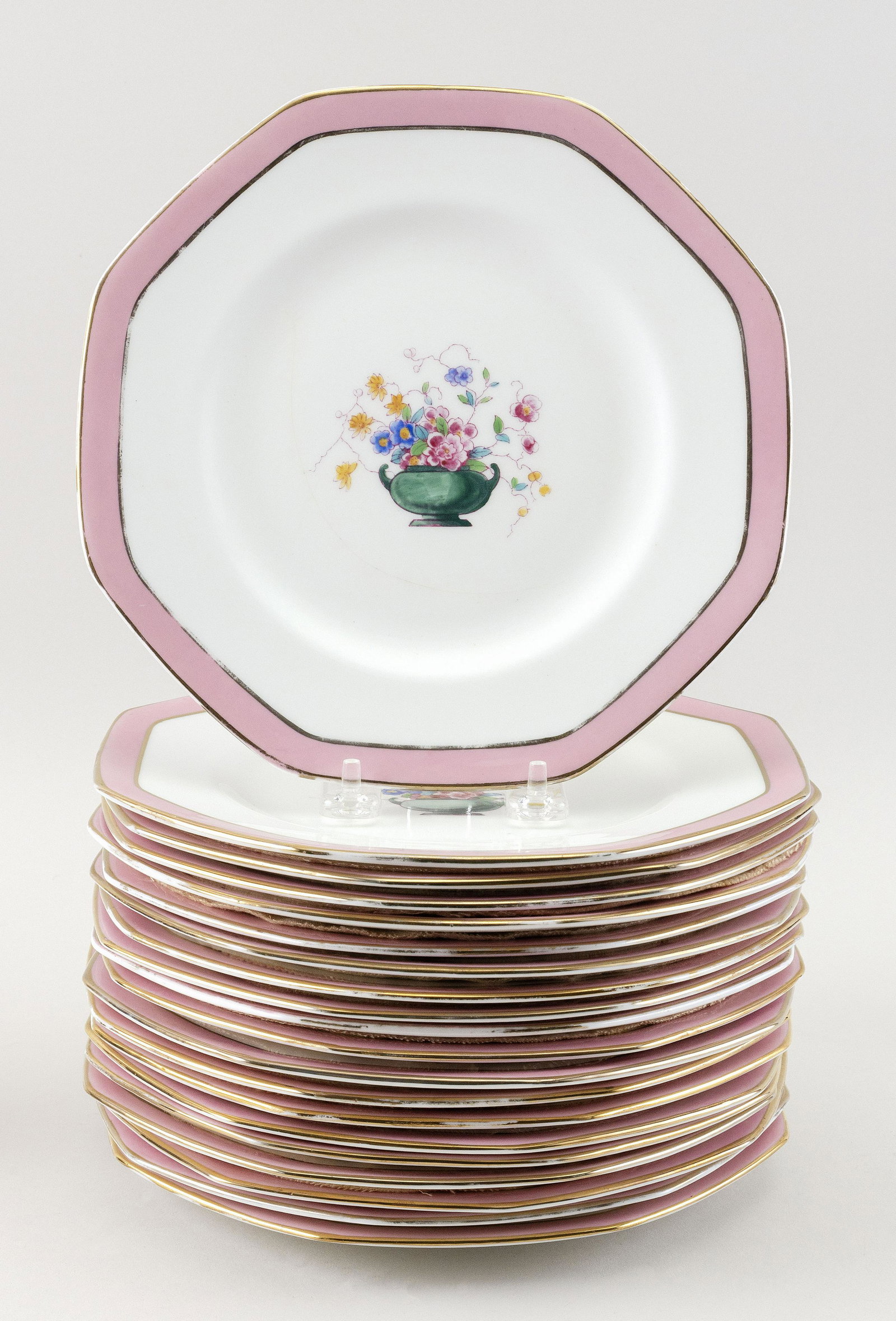SET OF TWENTY ROYAL DOULTON FOR TIFFANY & CO. DESSERT: SET OF TWENTY ROYAL DOULTON FOR TIFFANY & CO. DESSERT PLATES 1900-1930 Octagonal, with gilt rims, pink borders and central floral decoration. Widths 9.25".
