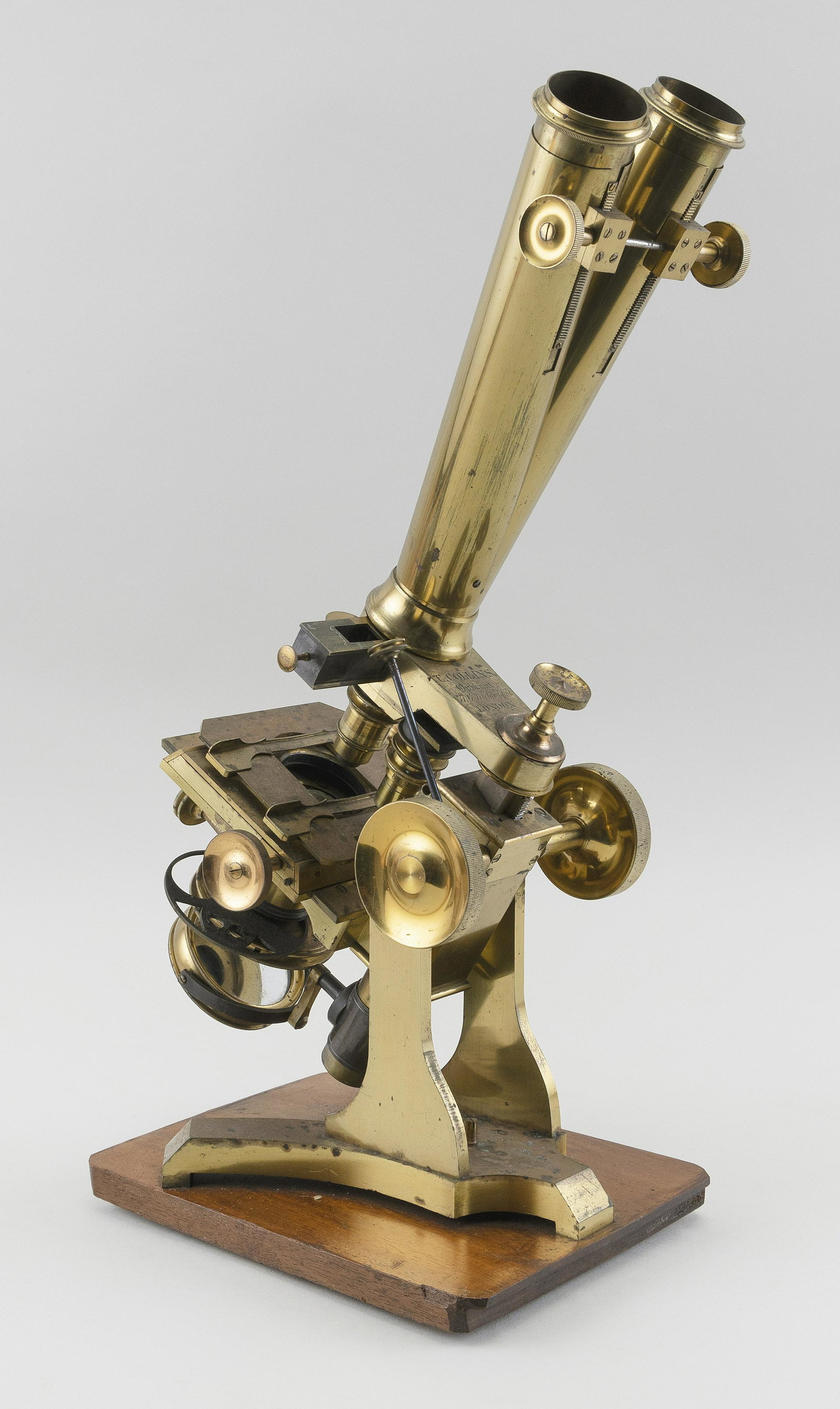 DOUBLE-LENS MICROSCOPE Height 17”.: DOUBLE-LENS MICROSCOPE Marked “C. Collins. Opheum London”. Height 17”.