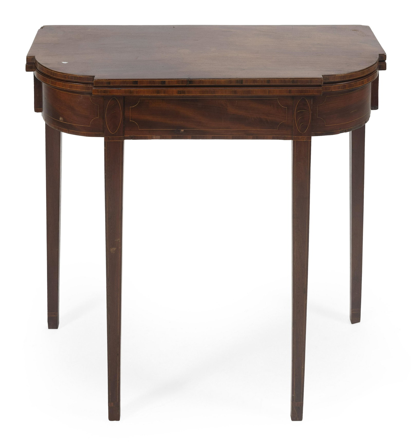 DIMINUTIVE HEPPLEWHITE CARD TABLE First Quarter of the: DIMINUTIVE HEPPLEWHITE CARD TABLE First Quarter of the 19th Century In mahogany and mahogany veneer. Shaped top with fruitwood banded inlay along edge. Delicate string inlay on skirt and tapered legs.