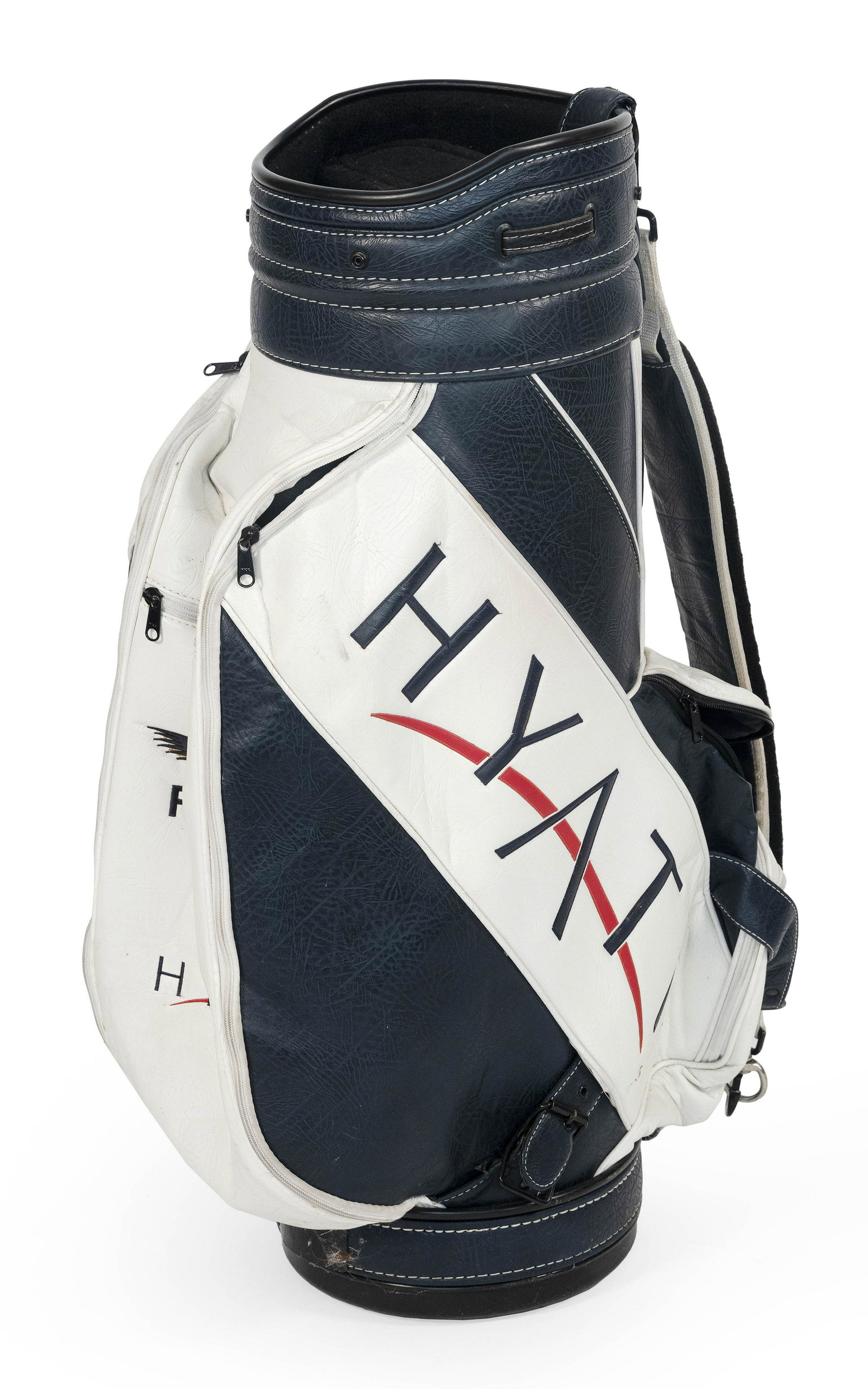 RAYMOND FLOYD-ISSUED FUNDRAISER TOURNAMENT GOLF BAG: RAYMOND FLOYD-ISSUED FUNDRAISER TOURNAMENT GOLF BAG Navy blue and white faux leather bag embroidered with Floyd’s name and tournament sponsor “Hyatt”. Height 35.25”.