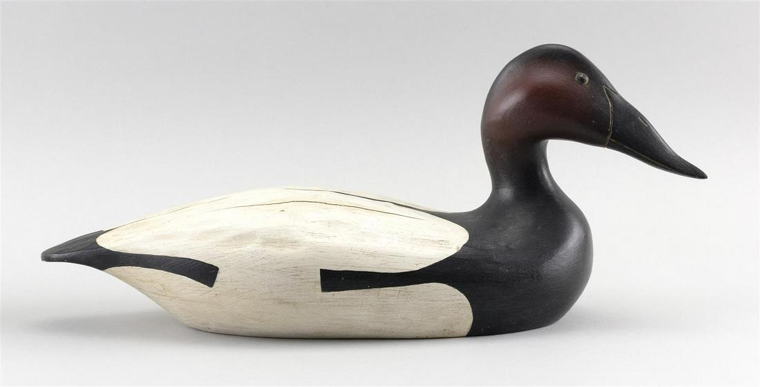 HANK WALKER CANVASBACK DECOY Newbury, Massachusetts,: HANK WALKER CANVASBACK DECOYNewbury, Massachusetts, 1919-1995Head turned right. Tack eyes. Antiqued finish.Length 17.5".
