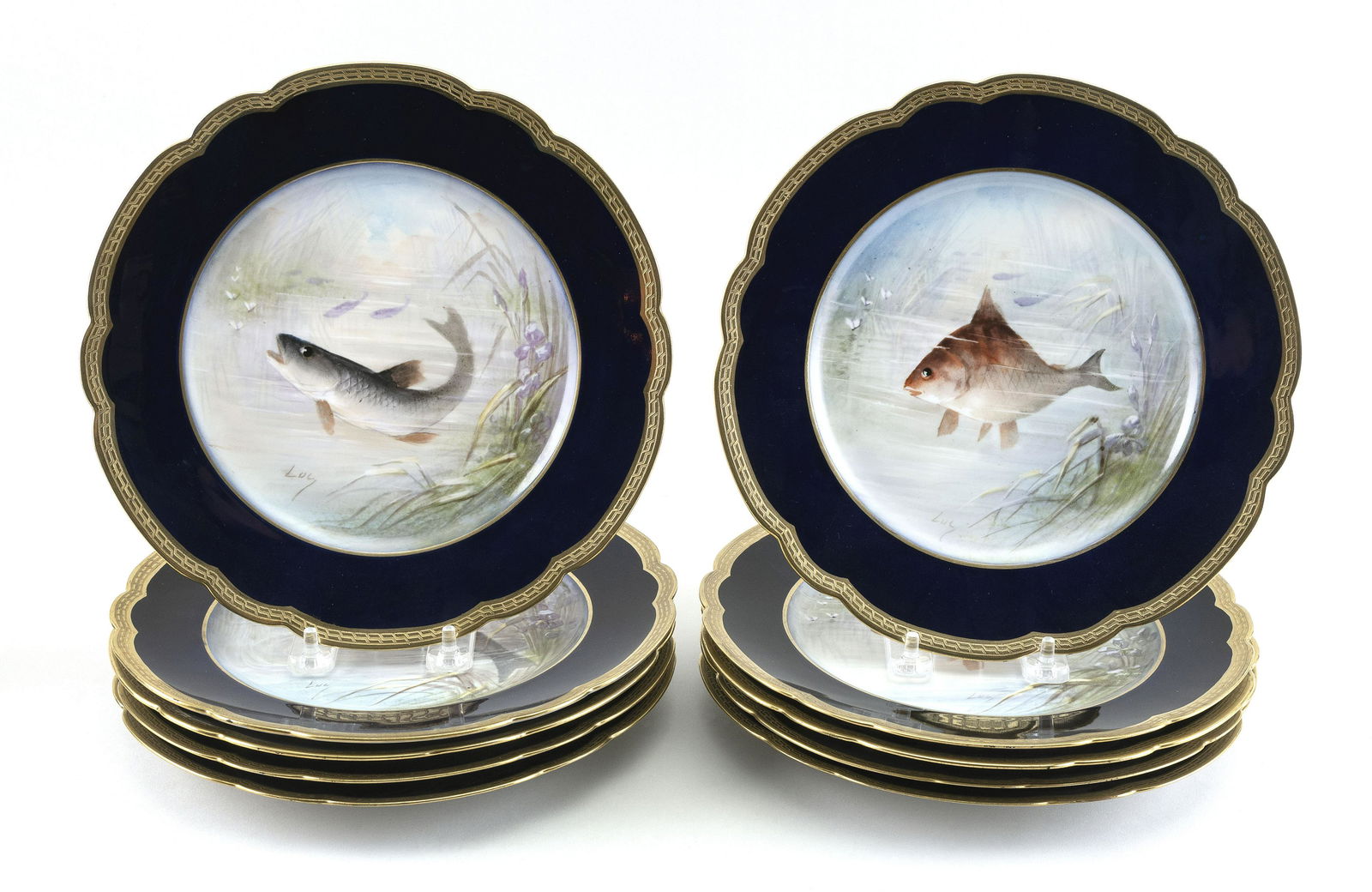 SET OF TEN LIMOGES PLATES WITH HAND-PAINTED FISH (1 of 2)