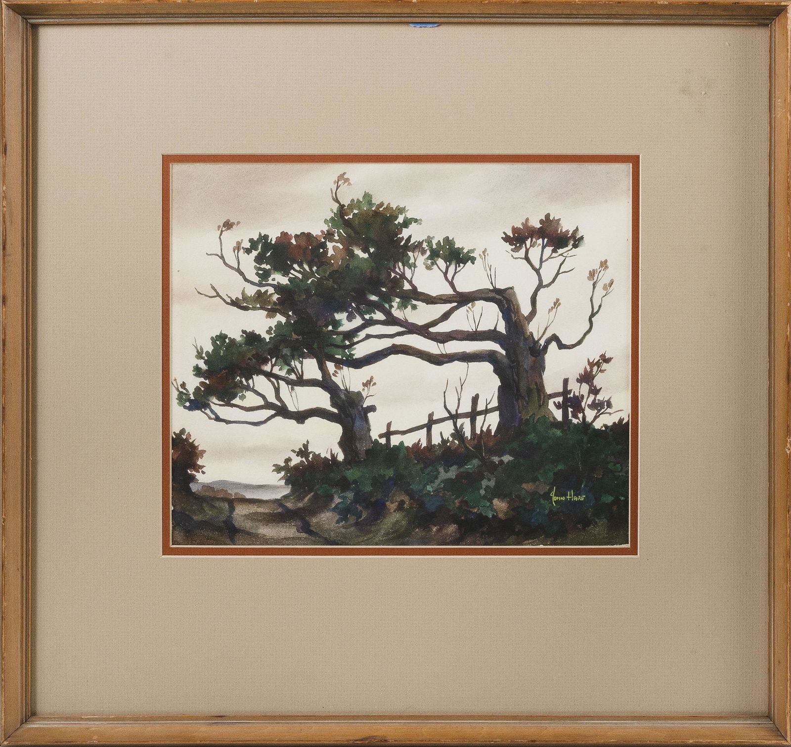 JOHN CUTHBERT HARE (Massachusetts/Florida, 1908-1978),: JOHN CUTHBERT HAREMassachusetts/Florida, 1908-1978Rural lane with gnarled trees and fence. Signed lower right “John Hare”.Watercolor on paper, 9.5” x 11.5”. Framed 19” x