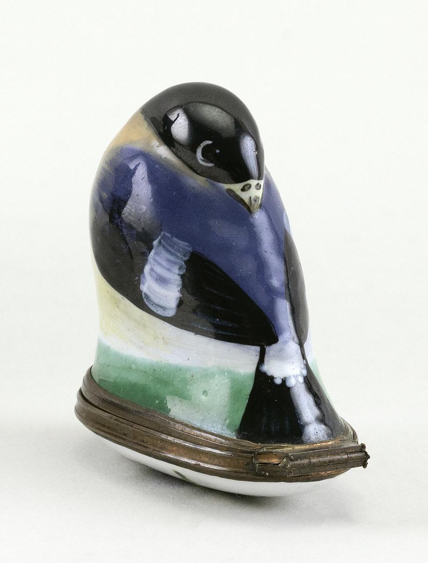 ENGLISH ENAMEL BIRD BONBONNIERE Circa 1770 Length: ENGLISH ENAMEL BIRD BONBONNIERE Circa 1770 In preening position on a green grass ground. Cover painted with a flower spray. Length 1.75".