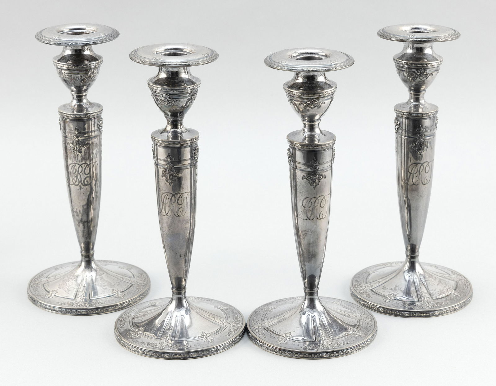 SET OF FOUR WEIGHTED STERLING SILVER CANDLESTICKS 20th (1 of 1)