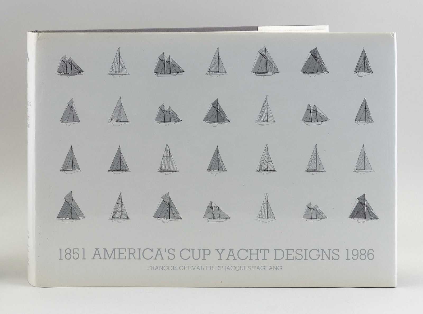 RARE YACHTING VOLUME "AMERICA'S CUP YACHT DESIGNS: RARE YACHTING VOLUME "AMERICA'S CUP YACHT DESIGNS 1851-1986" By Francois Chevalier and Jacques Taglang. Paris: Chevalier & Taglang, 1987. Numbered 2,159 of a limited edition of 2,574 copies 