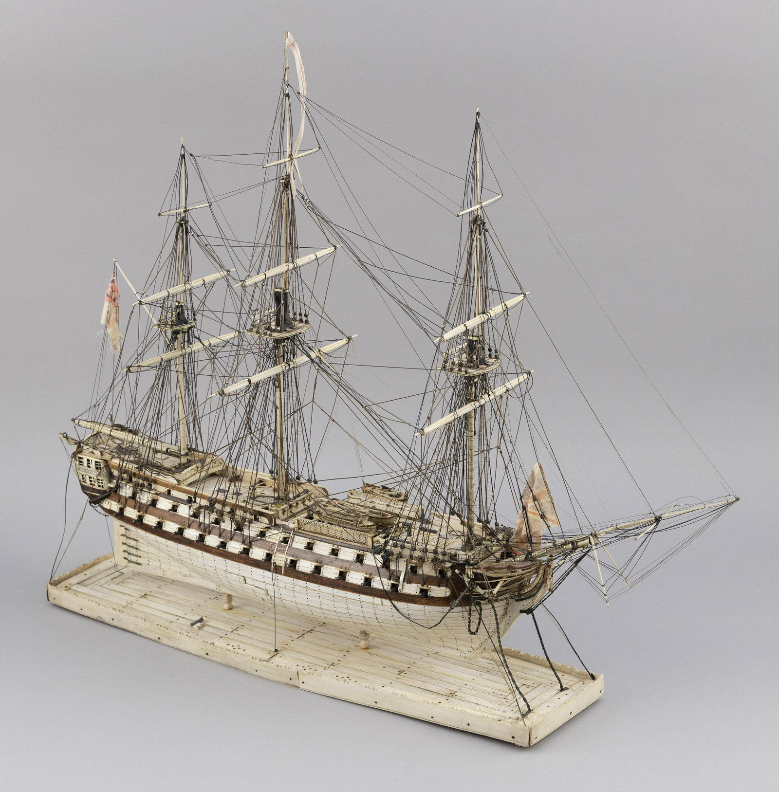 NAPOLEONIC PRISONER-OF-WAR-STYLE MODEL OF THE 90-GUN: NAPOLEONIC PRISONER-OF-WAR-STYLE MODEL OF THE 90-GUN SHIP OF THE LINE H.M.S. "OCEAN" England, 20th Century Attributed to Daniel Matthews. Hull built up from the solid and planked in bone with faux tru