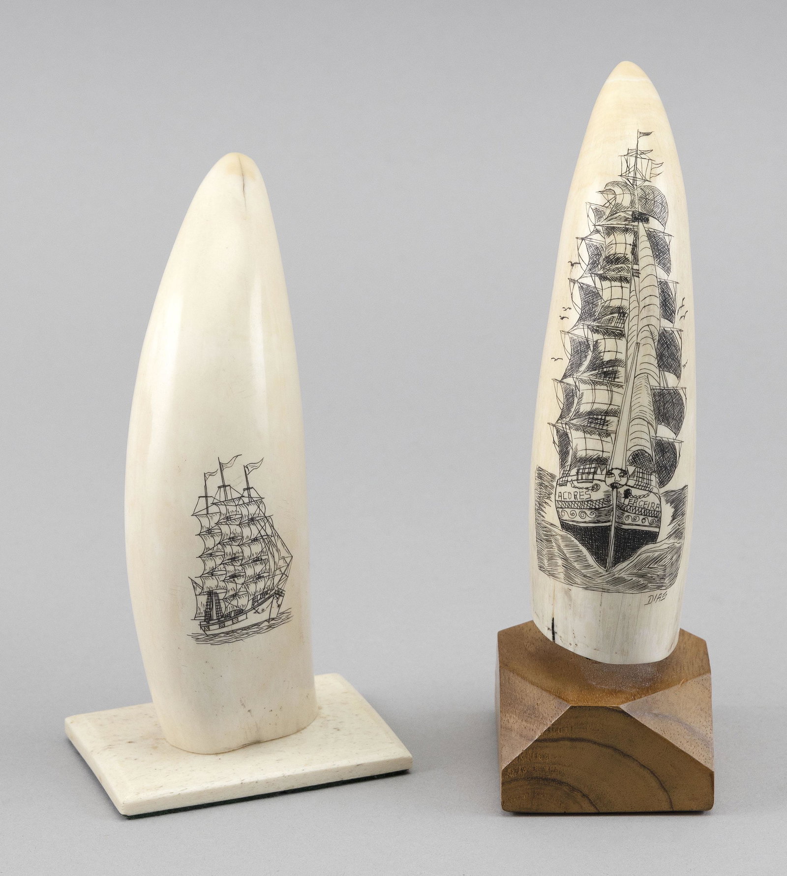 * TWO ENGRAVED WHALE'S TEETH WITH SHIP PORTRAITS 20th: * TWO ENGRAVED WHALE'S TEETH WITH SHIP PORTRAITS 20th Century Both bow views. One signed lower right "Dias" and depicts a ship with a prominent figural figurehead and labeled "Acores" and "Terceira" w