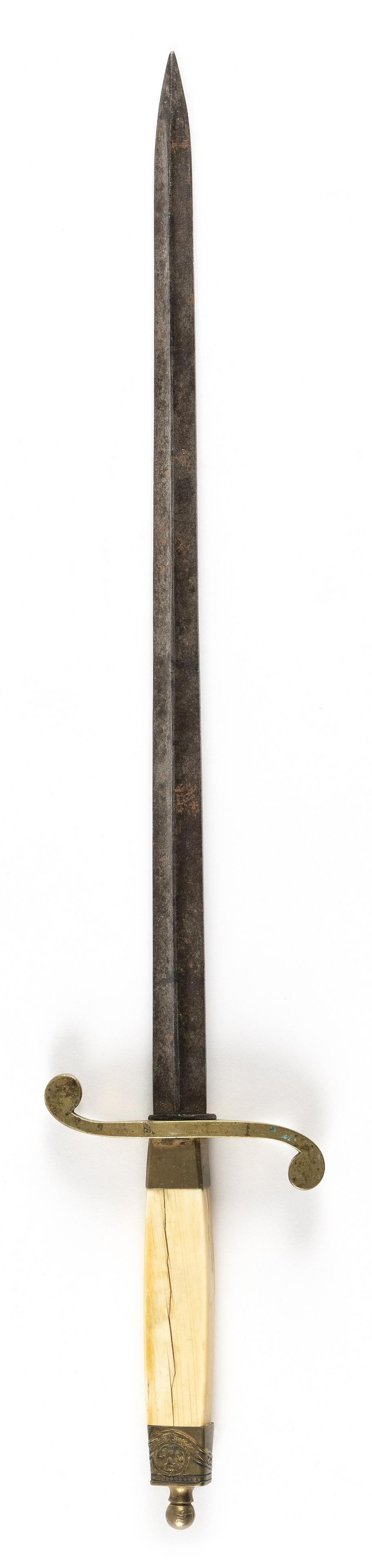 IMPERIAL RUSSIAN NAVAL OFFICER'S DIRK Circa 1914 Length of blade 12.5”. Total length 17”: IMPERIAL RUSSIAN NAVAL OFFICER'S DIRKCirca 1914Bone and brass handle, the pommel marked with a crown.Length of blade 12.5”. Total length 17”.