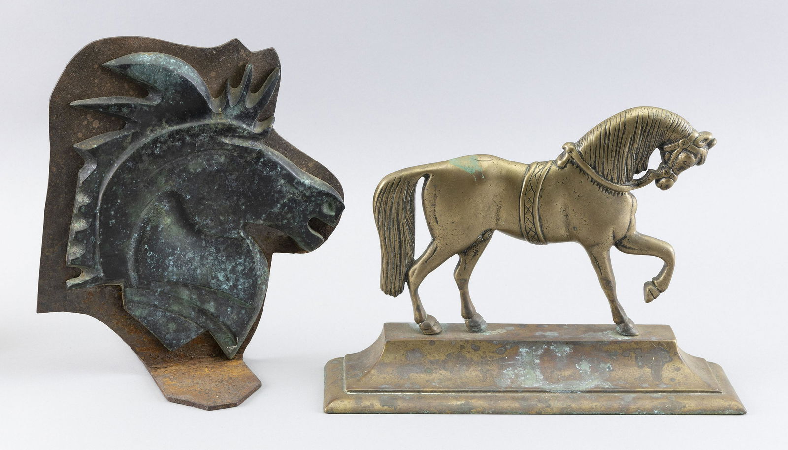 TWO METAL HORSE-FORM DOORSTOPS Heights 9” and 10.75”. (1 of 2)