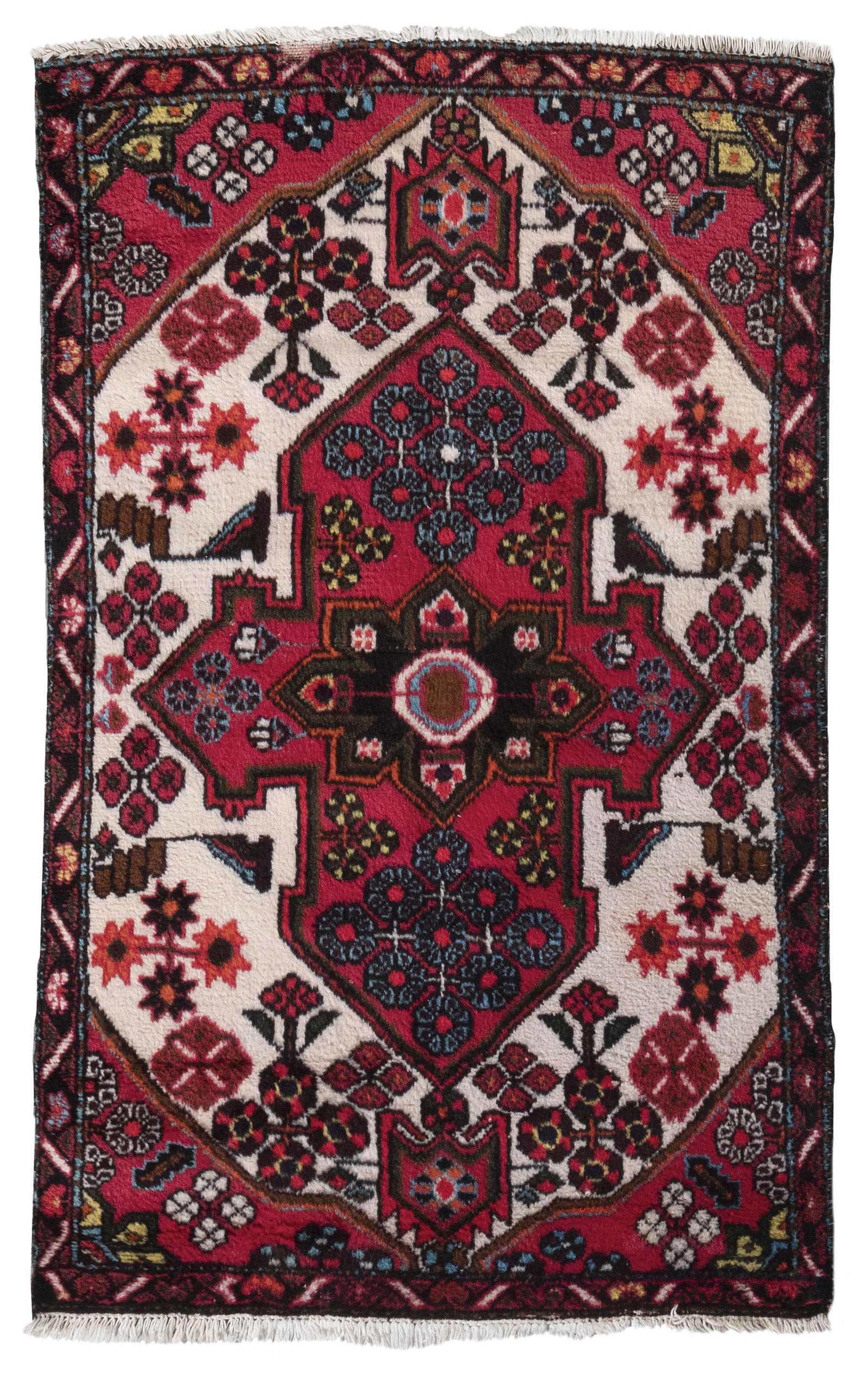 HAMADAN RUG: 3’2” X 5’0” Late 20th Century: HAMADAN RUG: 3’2” X 5’0” Late 20th Century Ivory field with a central rich red shield-form medallion that contains, and is surrounded by, a variety of colorful flower clusters.