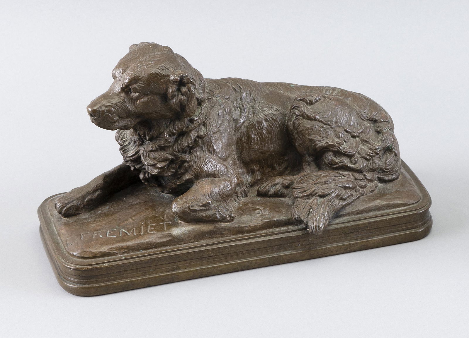 EMMANUEL FREMIET (France, 1824-1910), Reclining dog., Bronze, height 6". Length 10". (1 of 3)