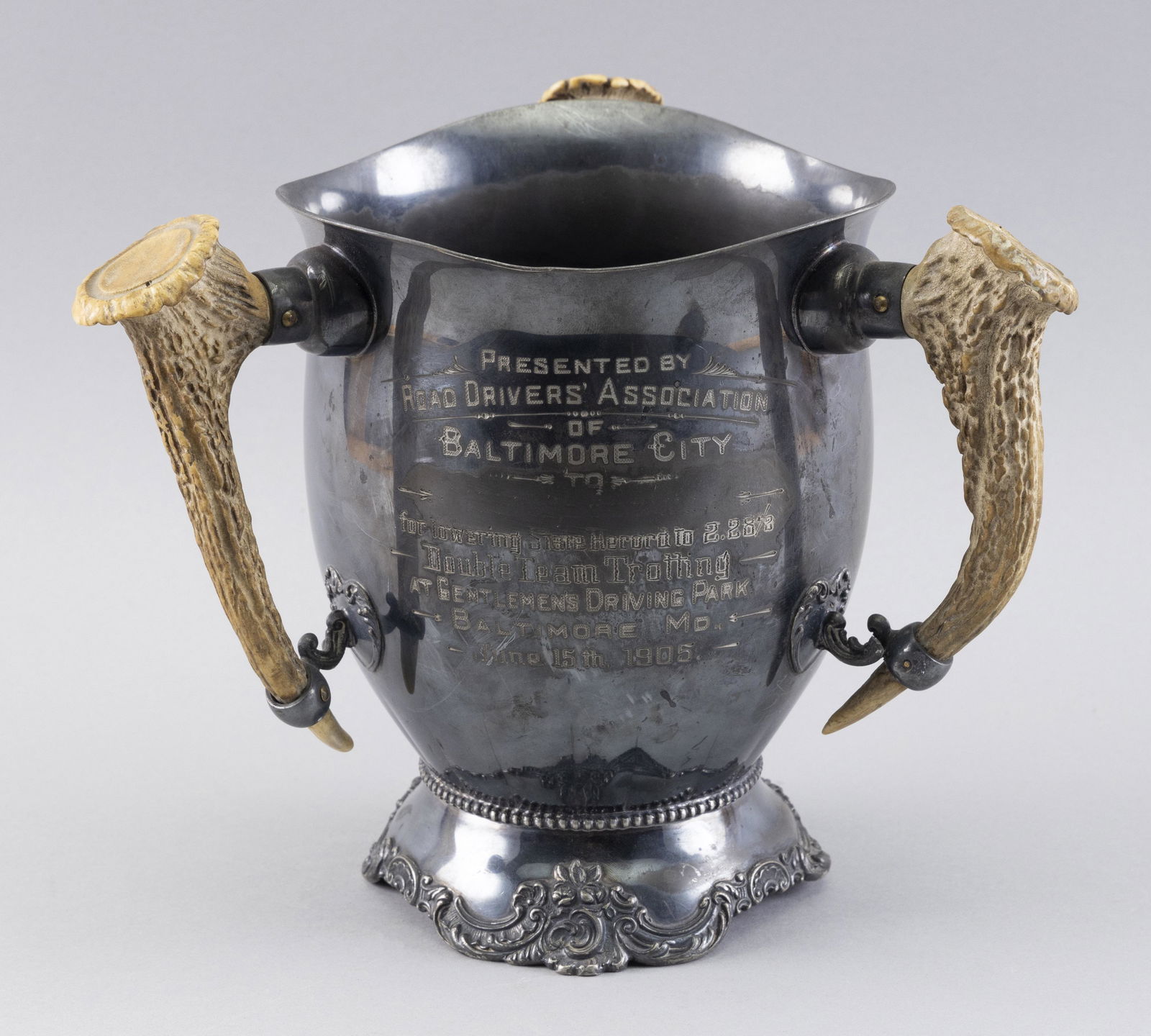 SILVER PLATED TROPHY Dated 1905 Height 8.5”. Width approx. 10”. (1 of 2)
