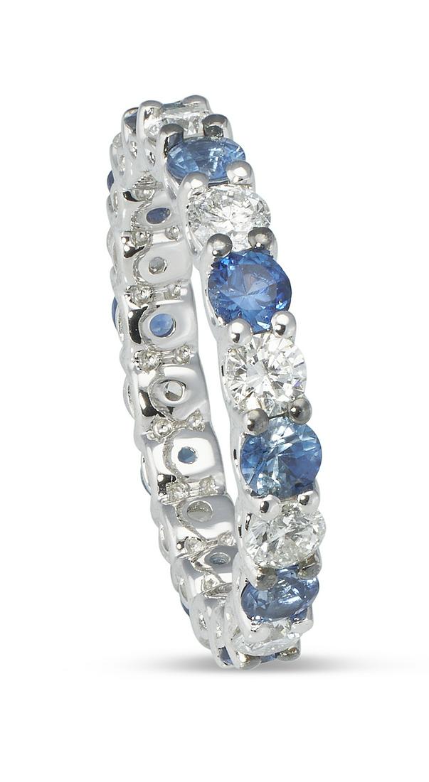 14KT WHITE GOLD, DIAMOND AND SAPPHIRE ETERNITY BAND Approx. 2.10 total dwt. (1 of 1)