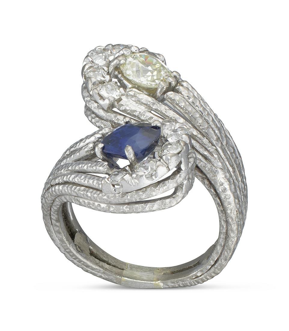 14KT WHITE GOLD, DIAMOND AND SAPPHIRE BYPASS RING Approx. 8.62 total dwt. (1 of 1)