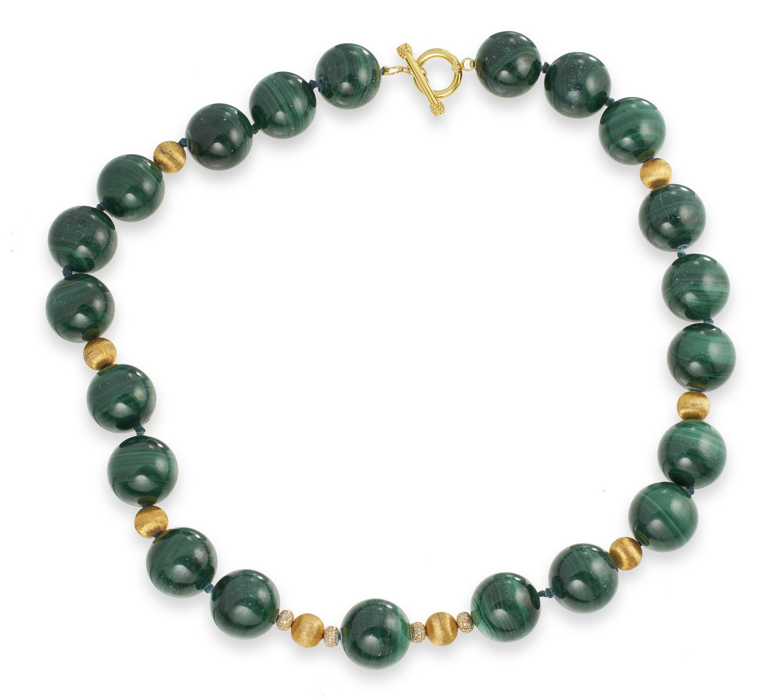 18KT YELLOW GOLD AND MALACHITE BEAD NECKLACE Approx. 233.80 total dwt.: 18KT YELLOW GOLD AND MALACHITE BEAD NECKLACE Approx. 233.80 total dwt. (No Reserve*) Consists of 21 approx. 20.0mm round malachite beads, eight approx. 9.0mm round Florentine gold spacers and four app