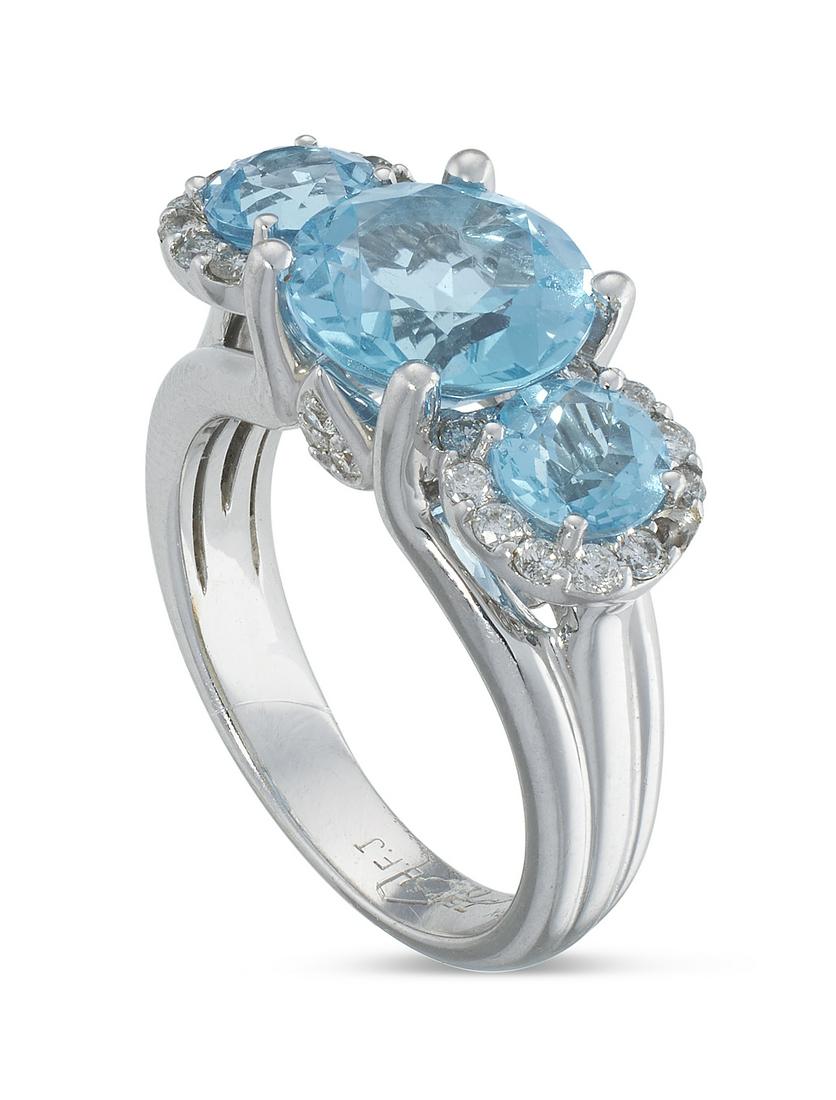 BLUE TOPAZ, DIAMOND AND 18KT WHITE GOLD THREE-STONE RING Approx. 6.3 dwt. (1 of 1)