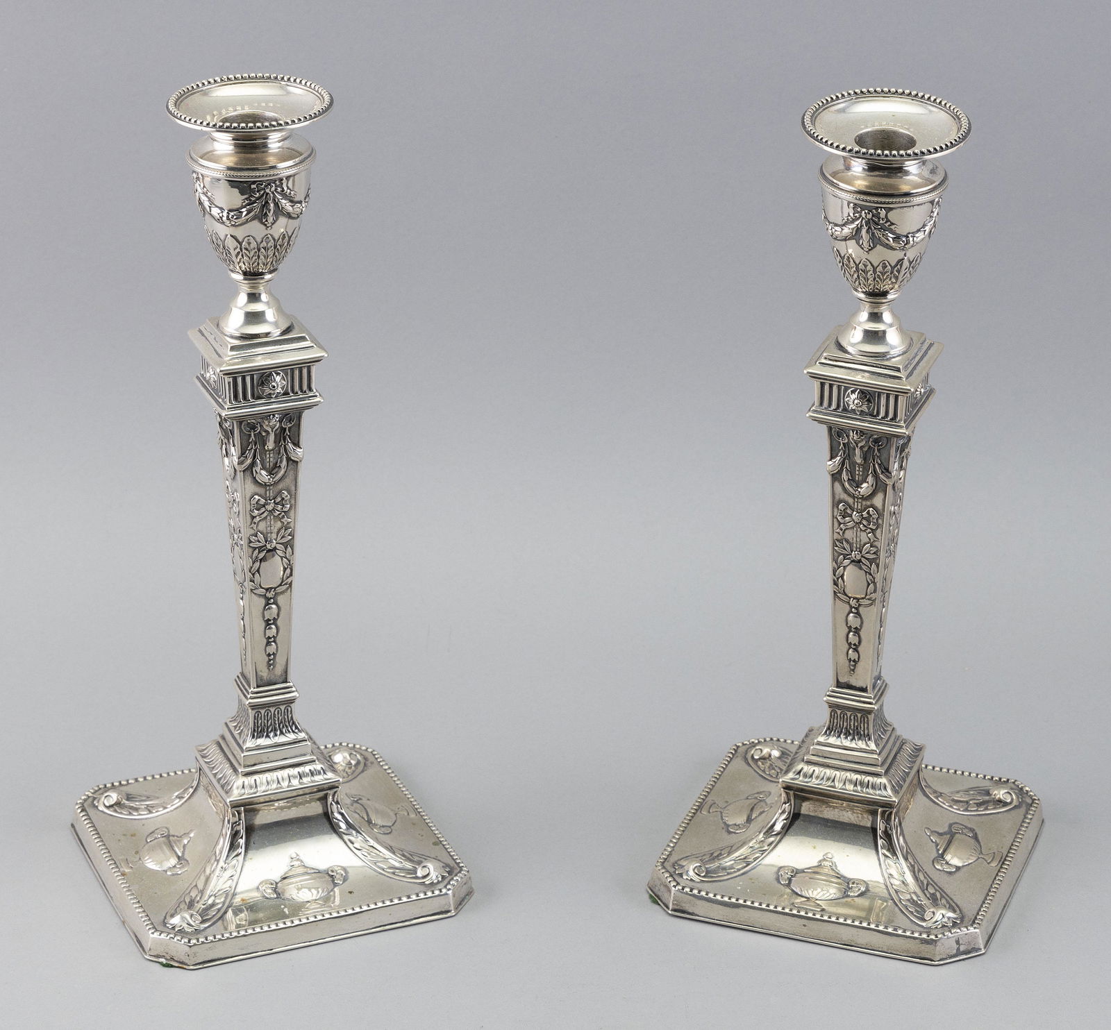 PAIR OF ADAMS-STYLE .800 SILVER CANDLESTICKS Late 19th/Early 20th Century (1 of 2)