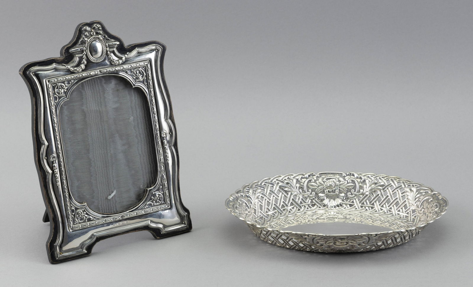TWO PIECES OF SILVER Early 20th Century Approx. 5.0 troy oz. weighable (not including frame). (1 of 2)