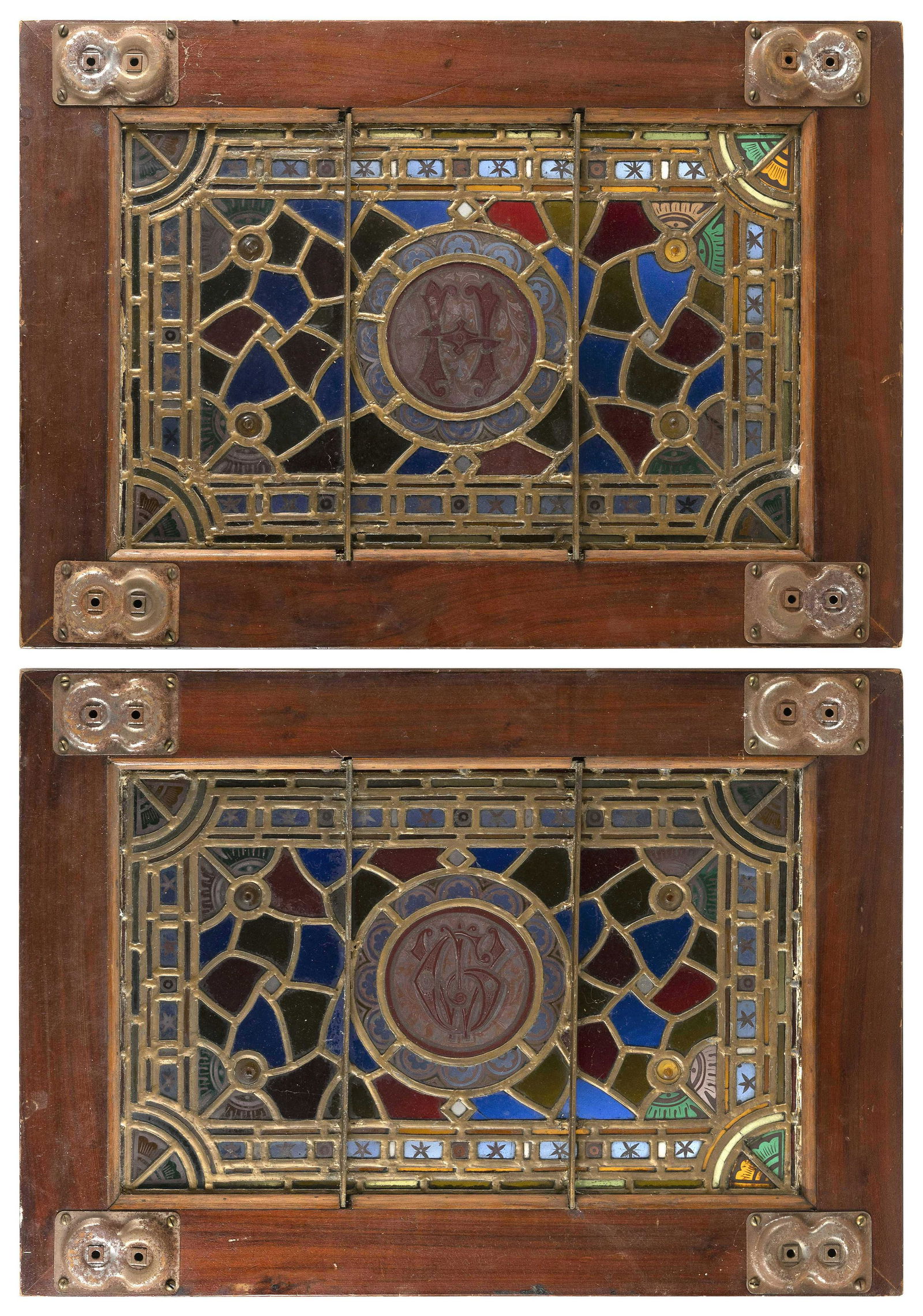 PAIR OF STAINED GLASS PANELS Late 19th/Early 20th Century Framed 26” x 18.5”. (1 of 2)