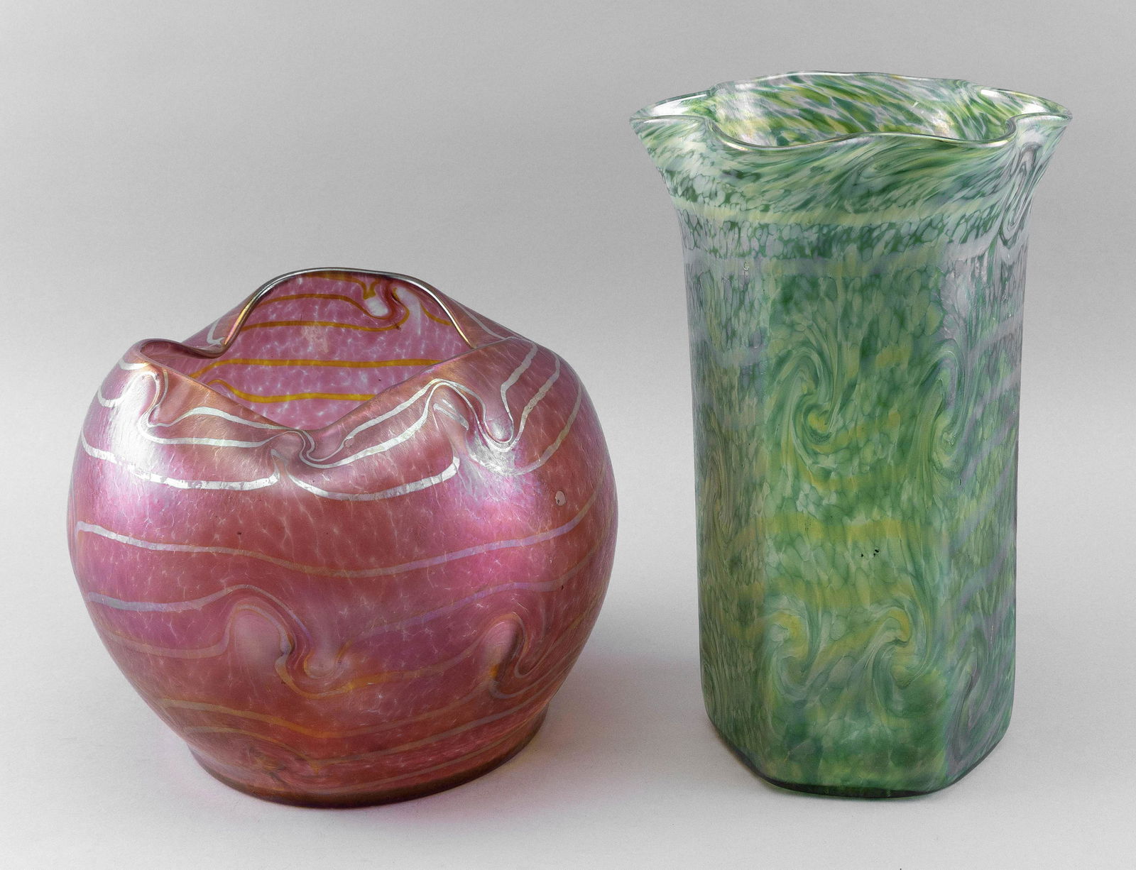 TWO LOETZ-TYPE BLOWN GLASS VASES Early 20th Century Heights 8" and 12". (1 of 4)