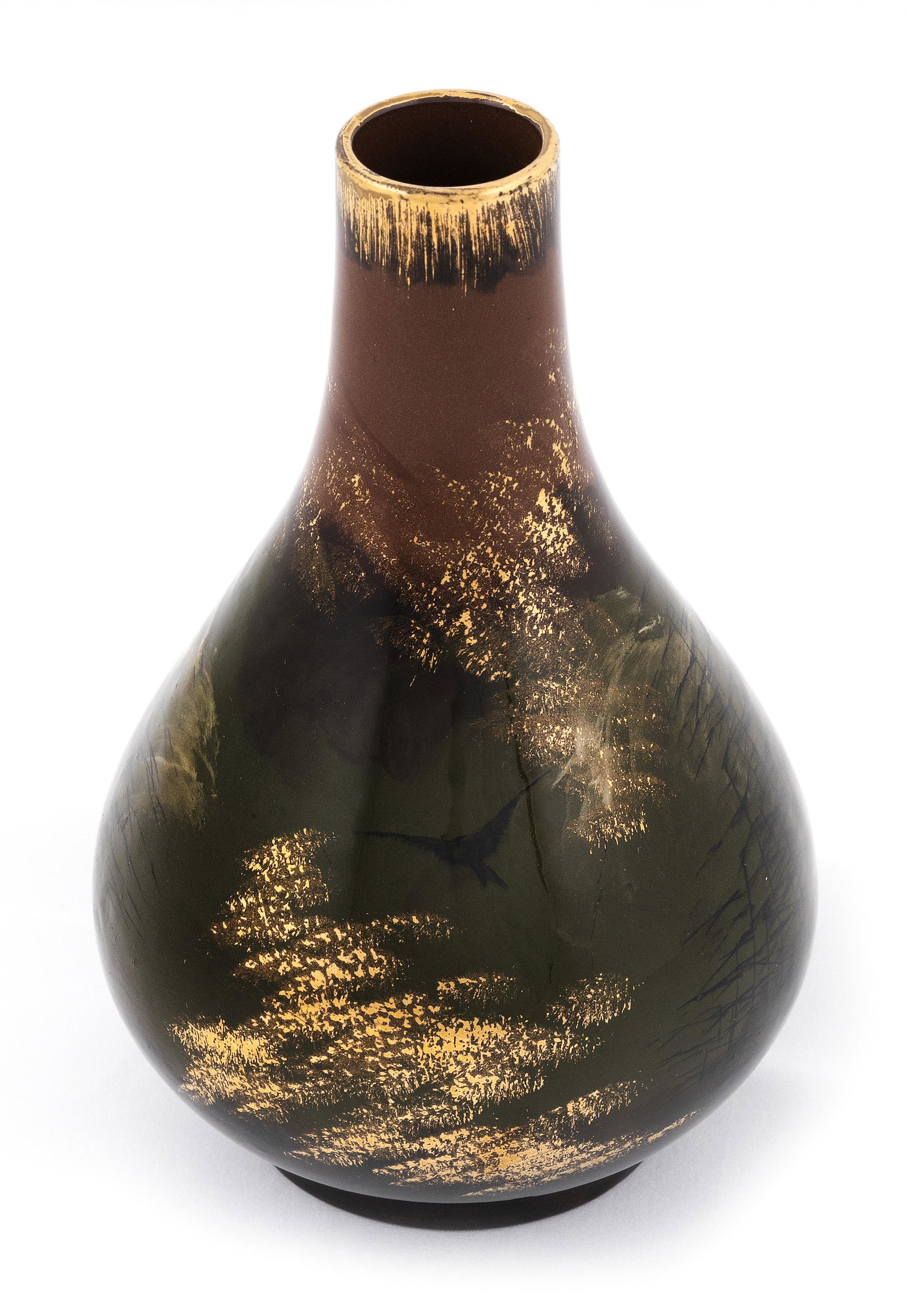 MARTIN RETTIG FOR ROOKWOOD POTTERY VASE Late 19th Century Height 6.75”. Diameter 4.5”.: MARTIN RETTIG FOR ROOKWOOD POTTERY VASE Late 19th Century Bulbous form with tapered neck. Bird and tree decoration with gilt highlights. Signed by Martin Rettig. Old label on underside for Jones, McDu