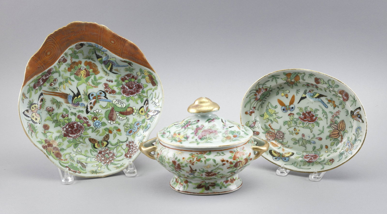 THREE PIECES OF CHINESE EXPORT CELADON PORCELAIN Mid-19th Century: THREE PIECES OF CHINESE EXPORT CELADON PORCELAINMid-19th CenturyA shrimp dish, length 10.5”, and a covered sauce tureen, height 6.25”, with undertray. Floral, insect and bird designs.