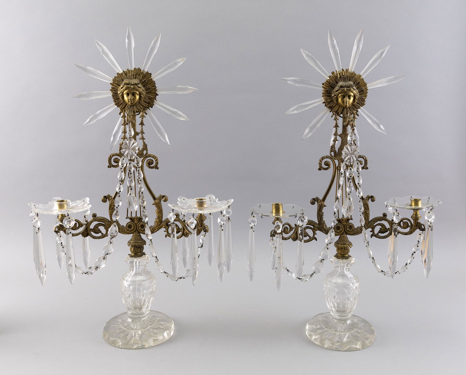 PAIR OF CONTINENTAL BRASS AND GLASS TWO-ARM CANDELABRA European, 19th Century Heights 23”. (1 of 2)
