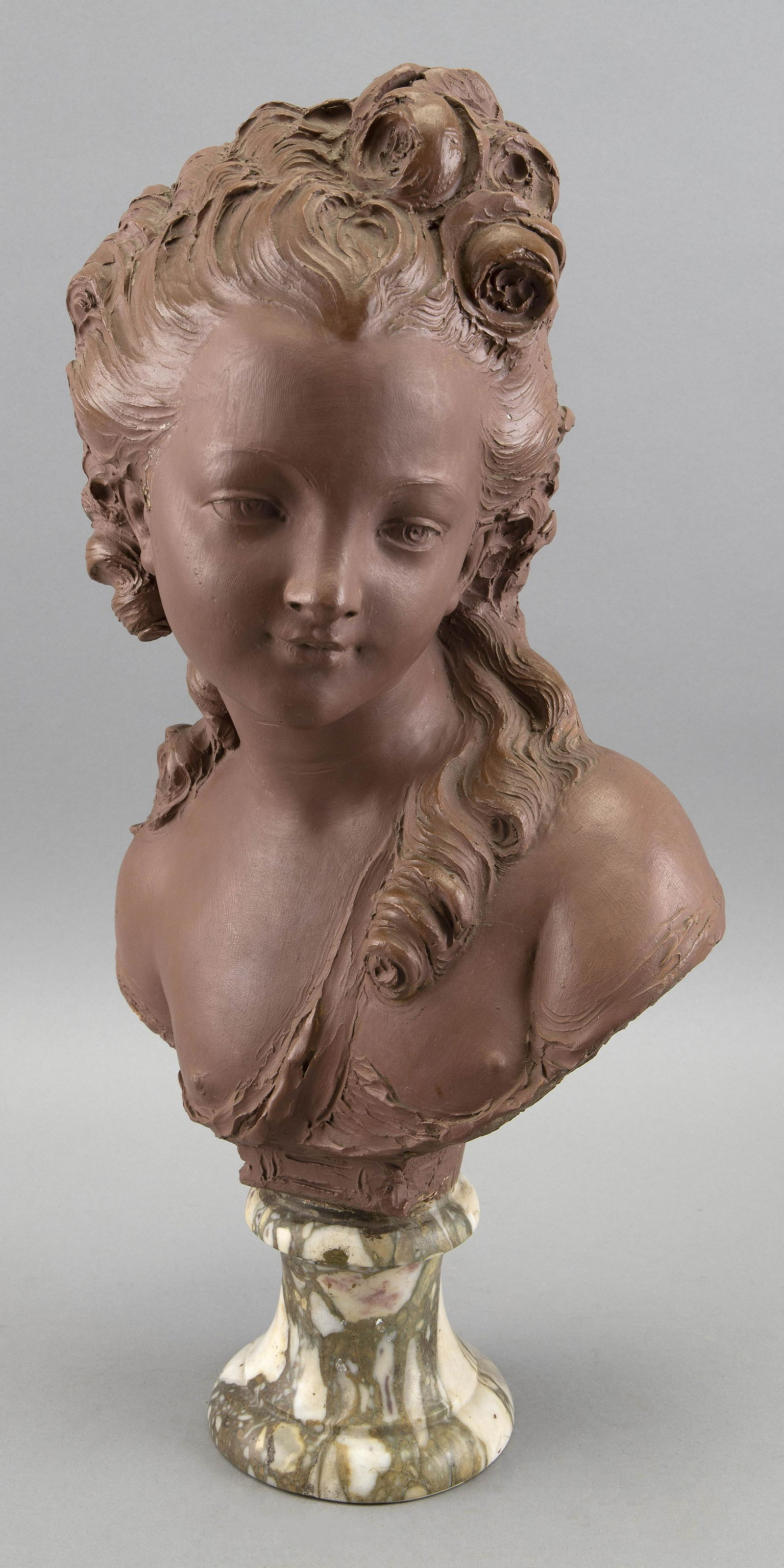FERNAND CIAN (Italy, 1889-1954), Bust of a young girl., Patinated terracotta, height 20”. (1 of 2)