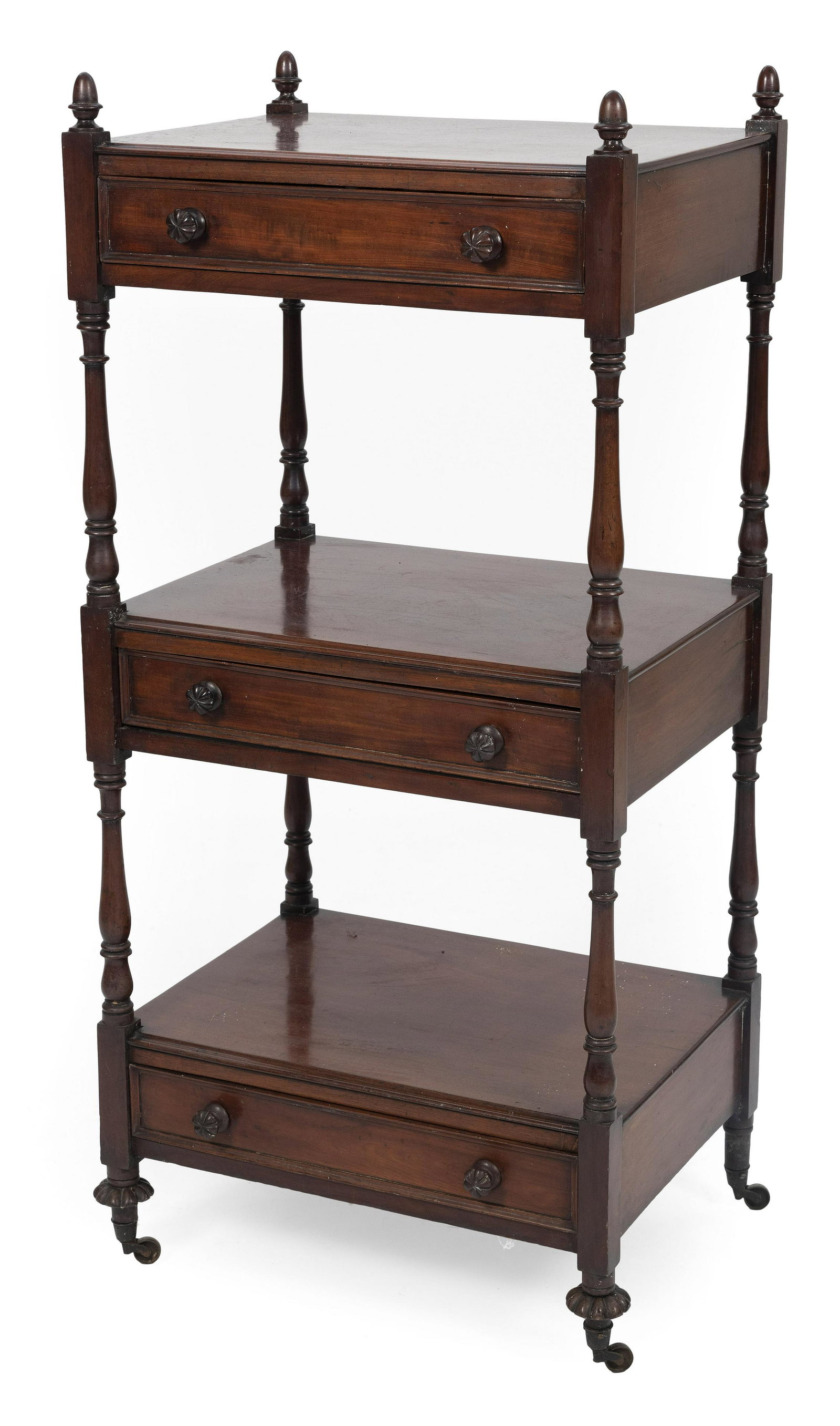 ENGLISH ÉTAGÈRE 19th Century Height 49”. Width 23”. Depth 17”.: ENGLISH ÉTAGÈRE 19th Century In mahogany. Three one-drawer tiers. Feet fitted with brass casters. Height 49”. Width 23”. Depth 17”.