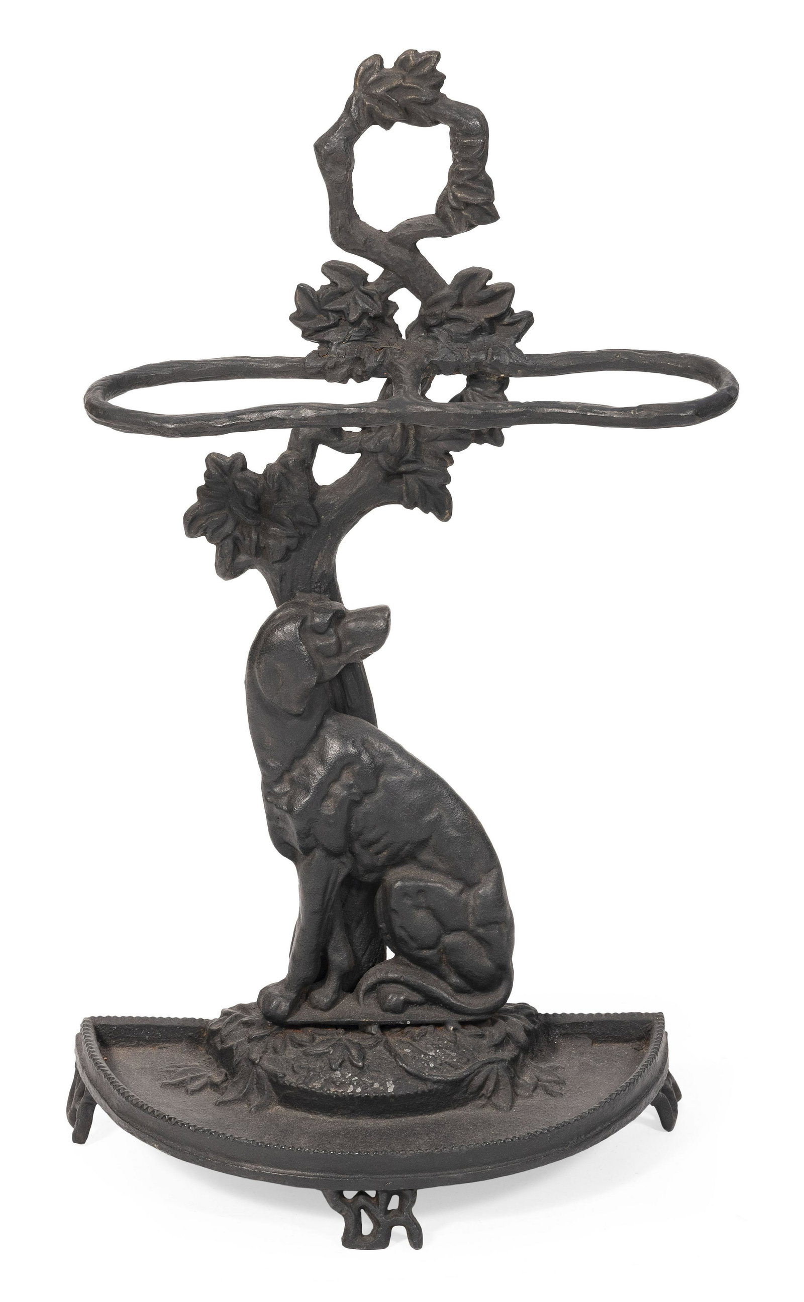 VICTORIAN CAST IRON UMBRELLA STAND Circa 1900 Height 28.75”. Width 16”. Depth approx.: VICTORIAN CAST IRON UMBRELLA STAND Circa 1900 Hunting dog motif. Under old black paint. Height 28.75”. Width 16”. Depth approx. 9”.