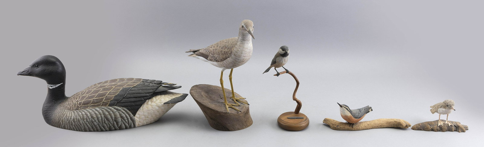 FIVE LIFE-SIZE BIRD CARVINGS Late 20th Century Heights from 3” to 11”. (1 of 3)