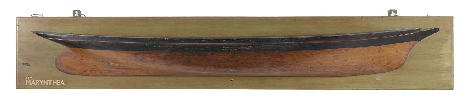 MOUNTED HALF HULL MODEL OF A STEAM/SAIL VESSEL Early 20th Century Backboard 10.5” x 62.5”: MOUNTED HALF HULL MODEL OF A STEAM/SAIL VESSELEarly 20th CenturyBlack hull and natural wood bottom. Original backboard with later moss green paint and a fictitious ship name at lower left corner.Backb