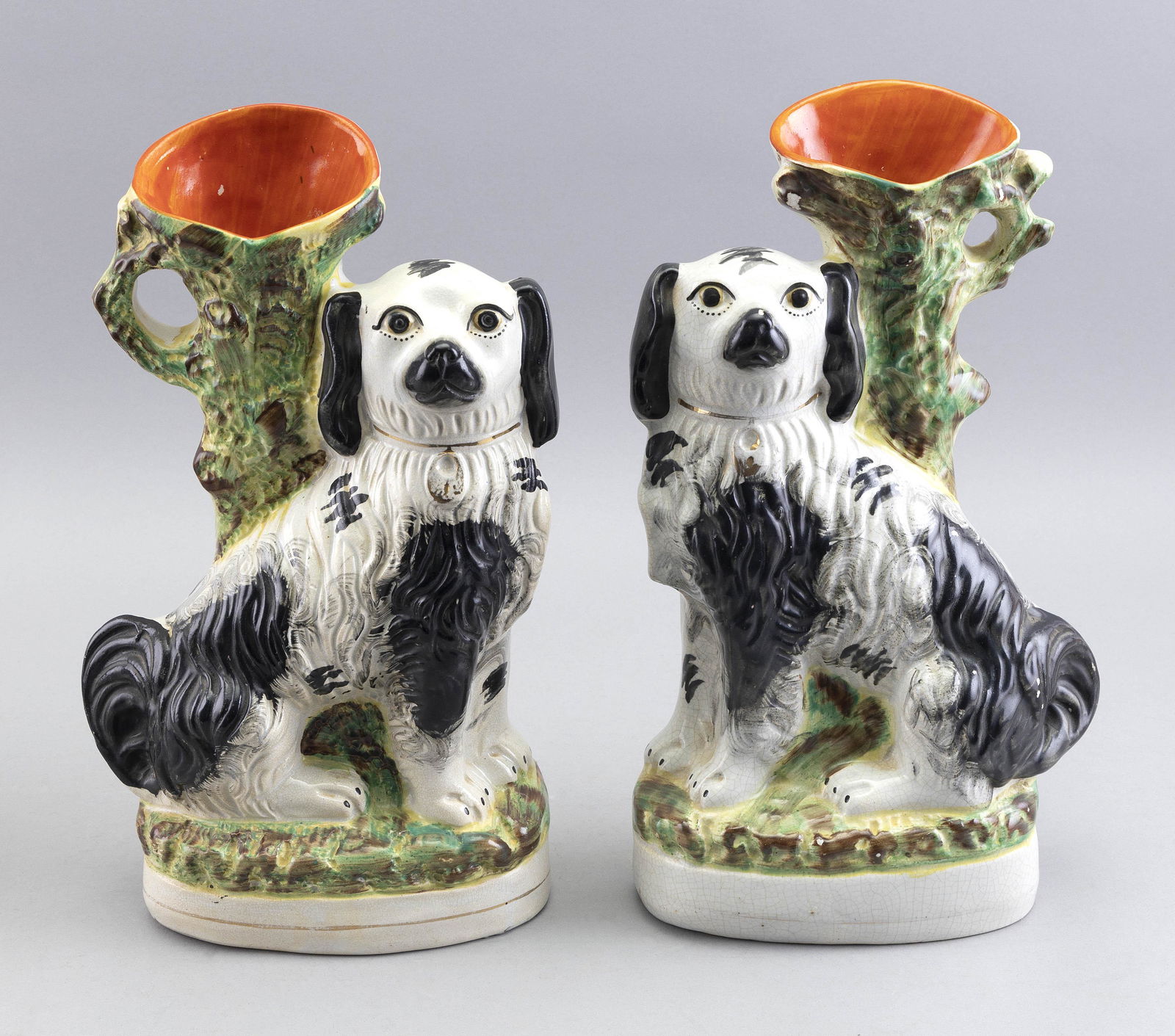 PAIR OF STAFFORDSHIRE SPANIEL VASES England, Third Quarter of the 19th Century Heights 13”. (1 of 2)