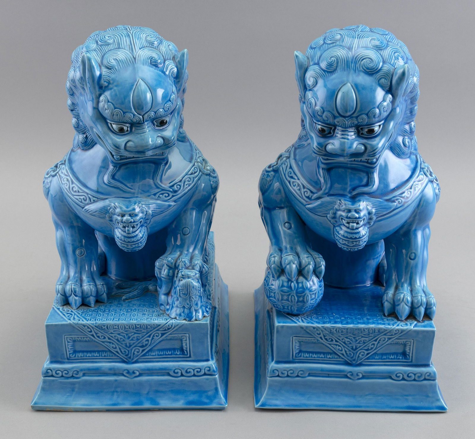 PAIR OF CHINESE TURQUOISE GLAZE PORCELAIN FOO DOGS Early 20th Century Heights 12". (1 of 2)