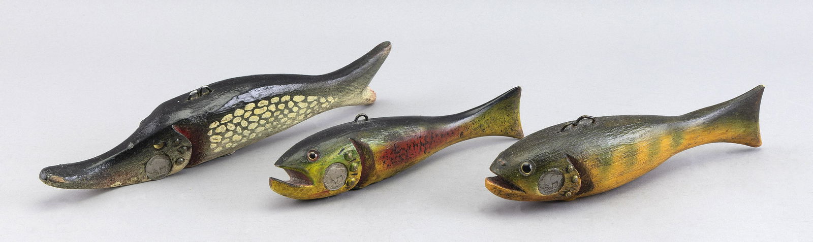 THREE DAVID PERKINS FISH DECOYS Late 20th Century Lengths from 9” to 12”. (1 of 3)