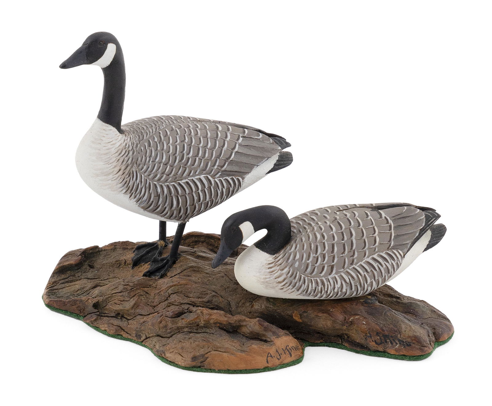 PAIR OF A.J. KING MINIATURE CANADA GEESE North Scituate, Rhode Island, 1881-1963 Height 4”. (1 of 3)