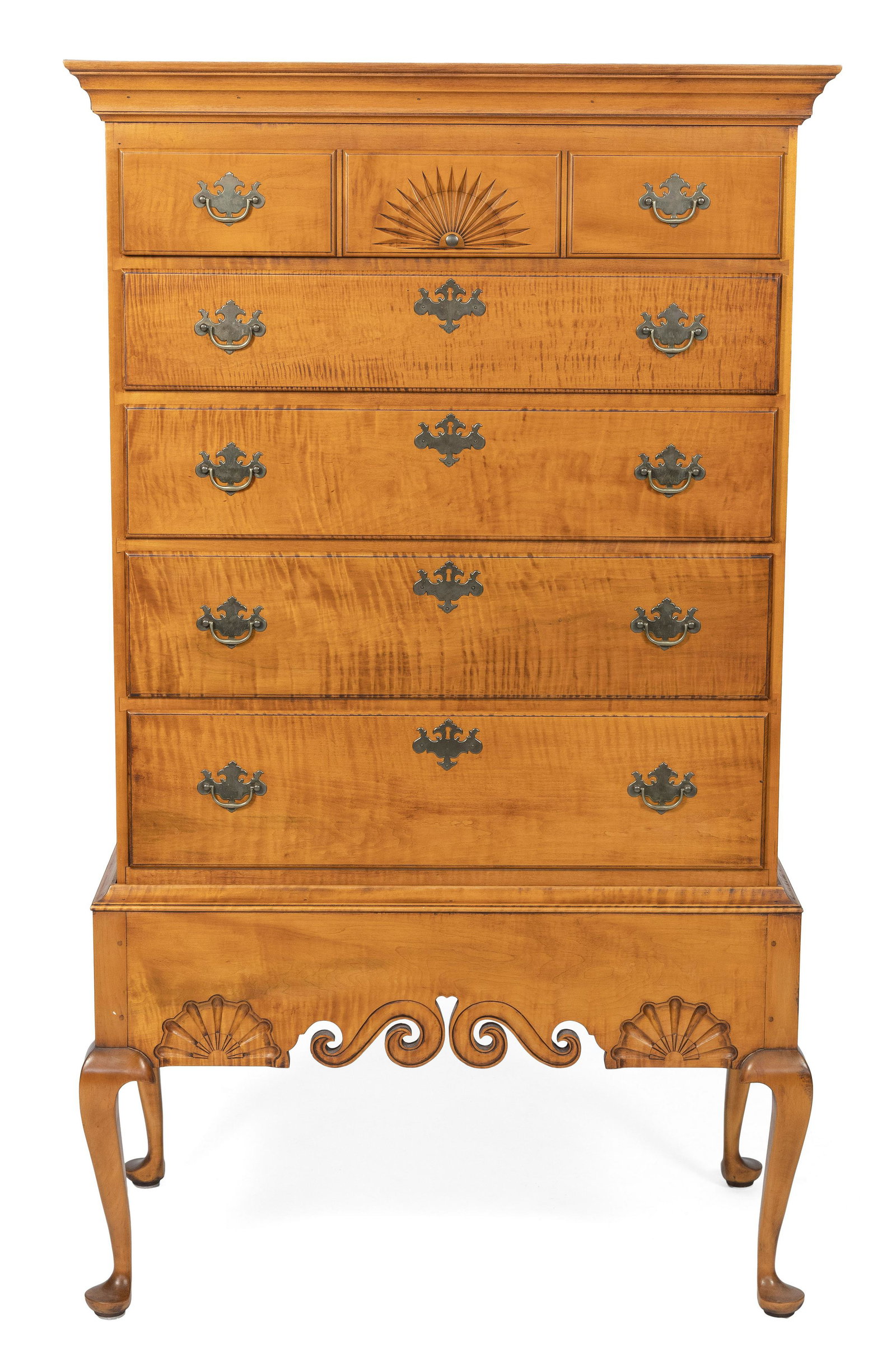ELDRED WHEELER QUEEN ANNE-STYLE CHEST-ON-FRAME 20th Century Height 62.5”. Width 36”.: ELDRED WHEELER QUEEN ANNE-STYLE CHEST-ON-FRAME 20th Century In maple and tiger maple. Upper case with five graduated full-width drawers, the top drawer simulating three side-by-side drawers with centr