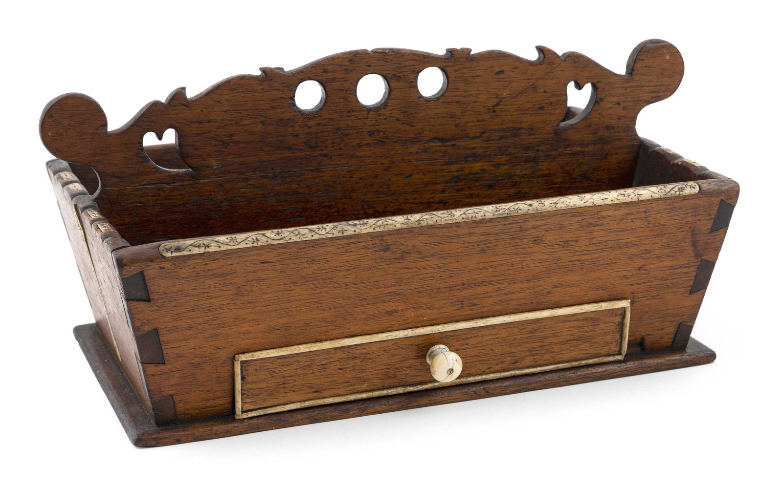 SAILOR-MADE KITCHEN KNIFE BOX Mid-19th Century Height 5.5”. Width 13.5”. Depth: SAILOR-MADE KITCHEN KNIFE BOX Mid-19th Century Walnut dovetail box with single drawer. Scrimshaw whalebone trim on edges, ends and drawer perimeter. Handle with pierced finger holes and hearts. Height