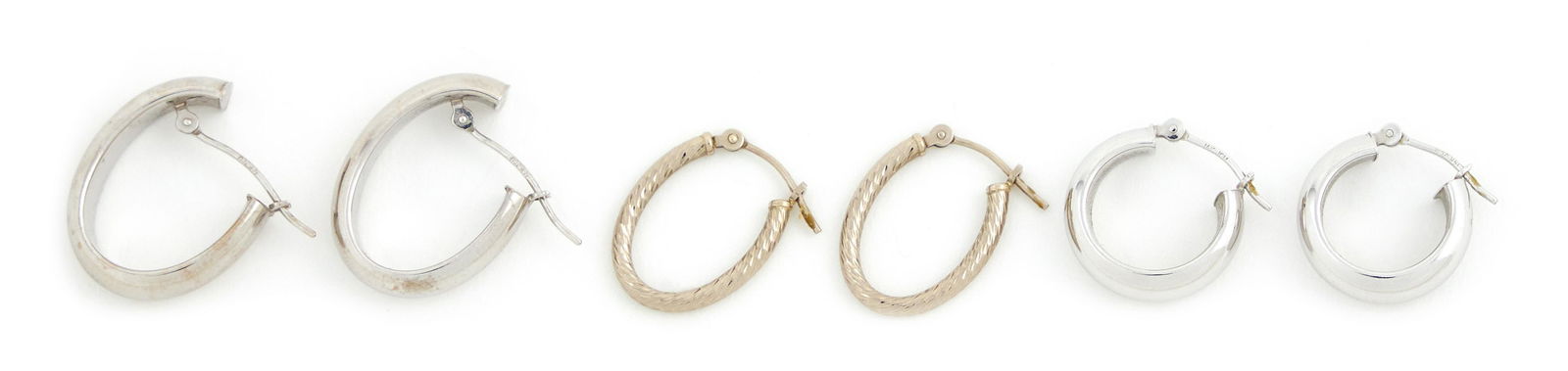 THREE PAIRS OF 14KT WHITE GOLD HOOP EARRINGS Approx. 2.19 total dwt. (1 of 1)