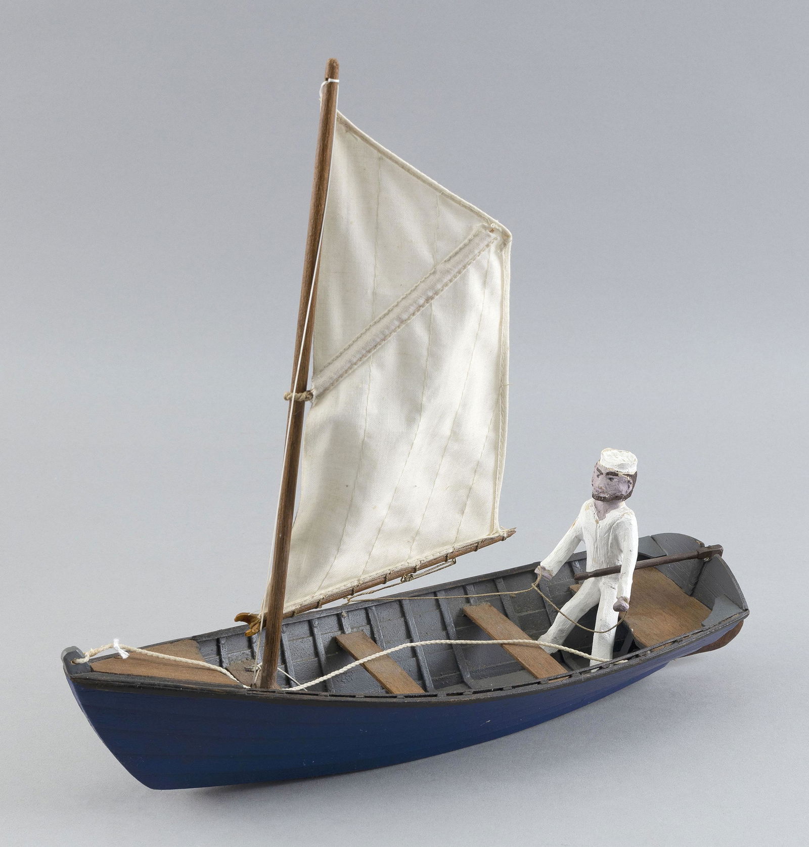 IRVING BRIGGS FOLK ART MODEL OF A SAILOR IN HIS BOAT Cape Cod, Massachusetts, 20th Century Length (1 of 2)