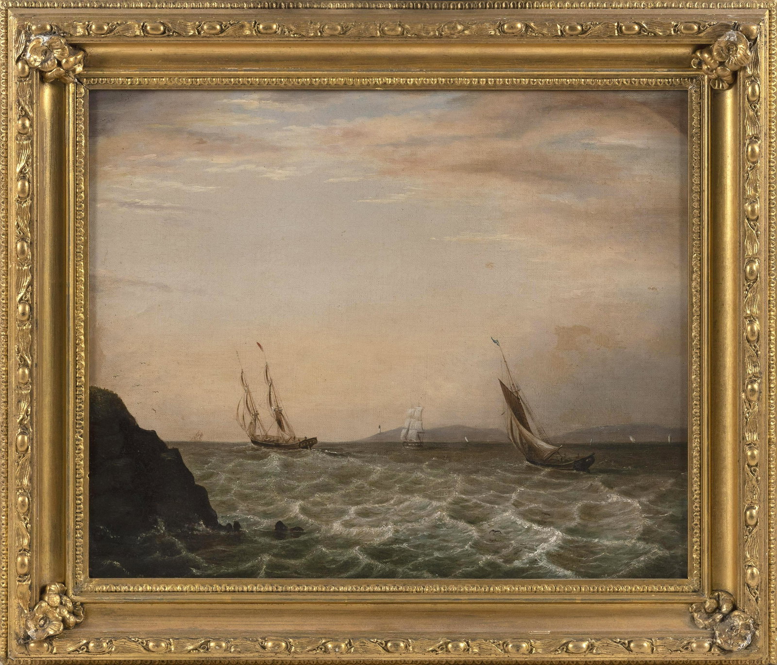 AMERICAN SCHOOL (19th Century,), Ships sailing off a rocky coast., Oil on canvas, 14" x 17". Framed: AMERICAN SCHOOL 19th Century Ships sailing off a rocky coast. Unsigned. Oil on canvas, 14" x 17". Framed 18" x 21".