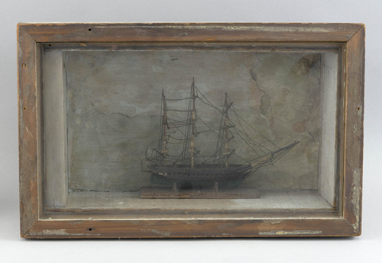 SHADOW BOX MODEL OF A THREE-MASTED VESSEL 19th Century Height 18.5”. Width 13.5”. Depth: SHADOW BOX MODEL OF A THREE-MASTED VESSEL 19th Century Height 8.5”. Width 13.5”. Depth 5.25”.