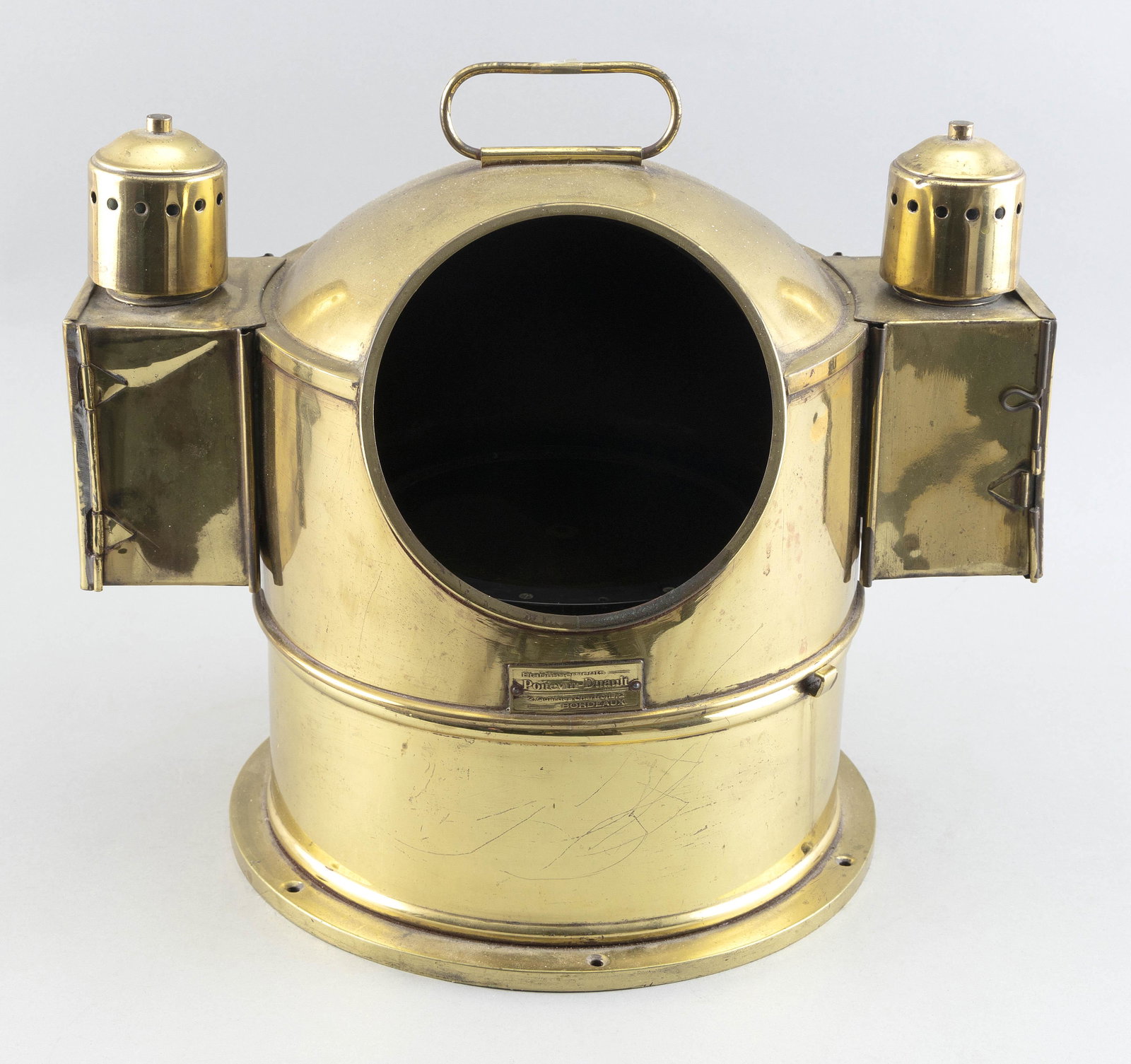 BRASS YACHT BINNACLE Early 20th Century Height 12.5”. Width 16”.: BRASS YACHT BINNACLE Early 20th Century Marked on plaque “Pottevian Duaulty”. Height 12.5”. Width 16”.