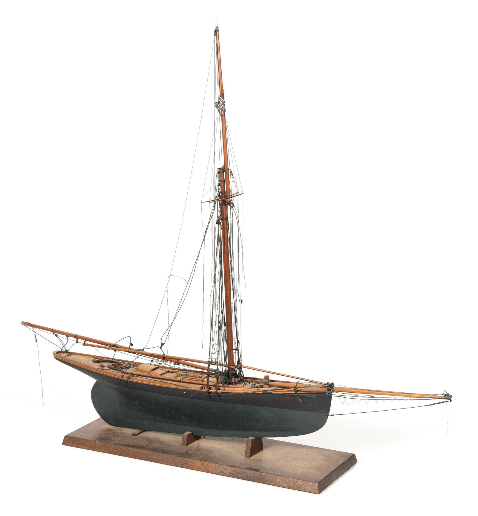 PLANK-ON-FRAME MODEL OF A GAFF-RIGGED SLOOP 20th Century Height on cradle approx. 36”. Length (1 of 2)