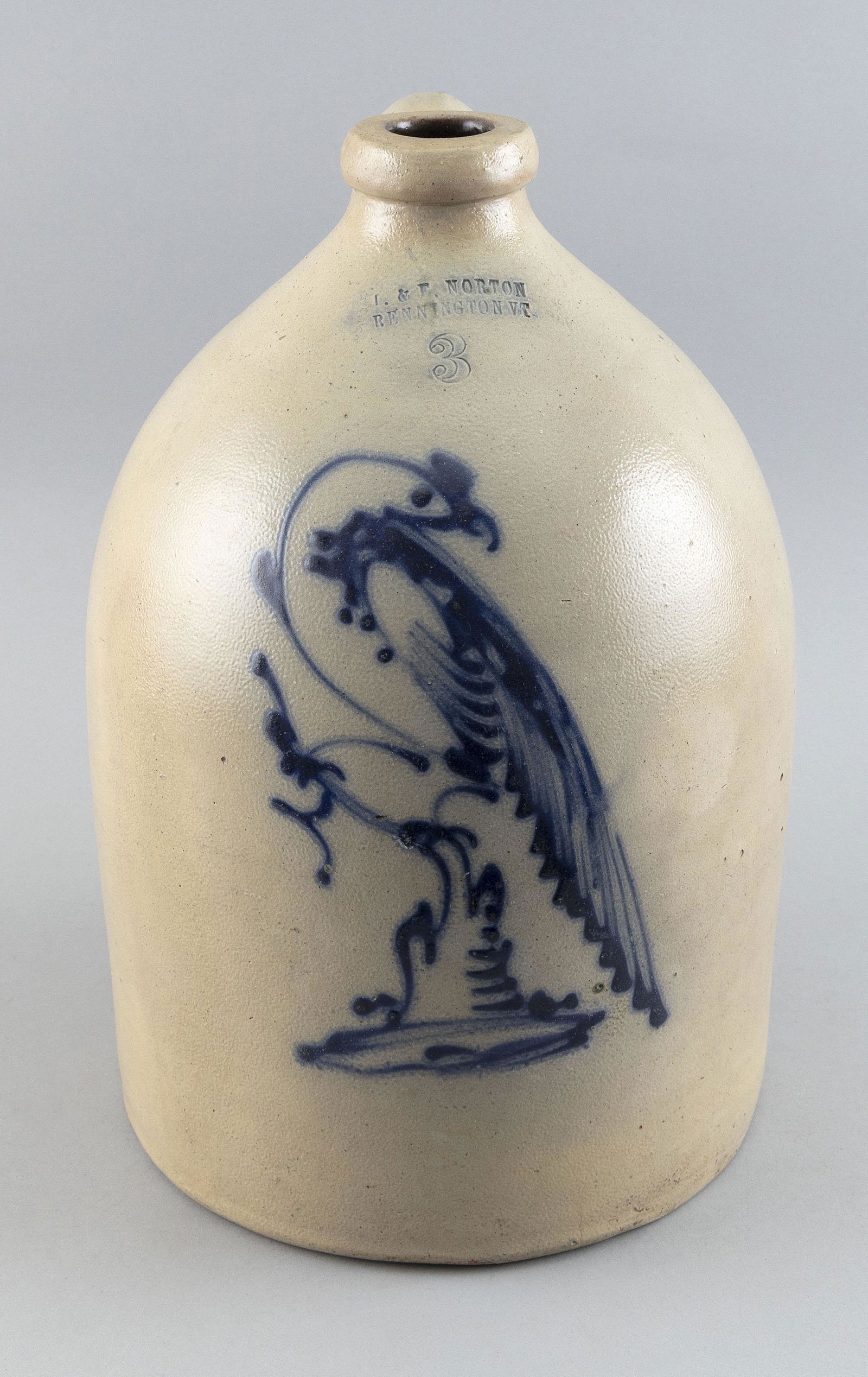 THREE-GALLON STONEWARE JUG BY L. & E. NORTON, BENNINGTON, VERMONT 19th Century Height 15.75". (1 of 2)