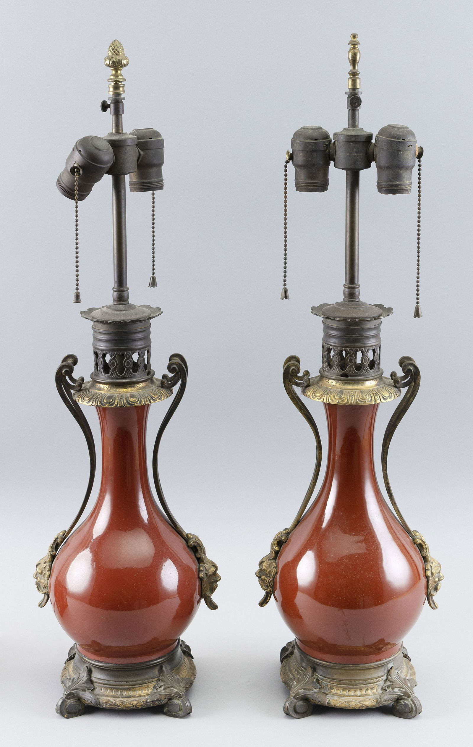 PAIR OF CHINESE SANG DE BOEUF PORCELAIN BOTTLE VASES 19th Century Heights 9.5”. Mounted as (1 of 5)